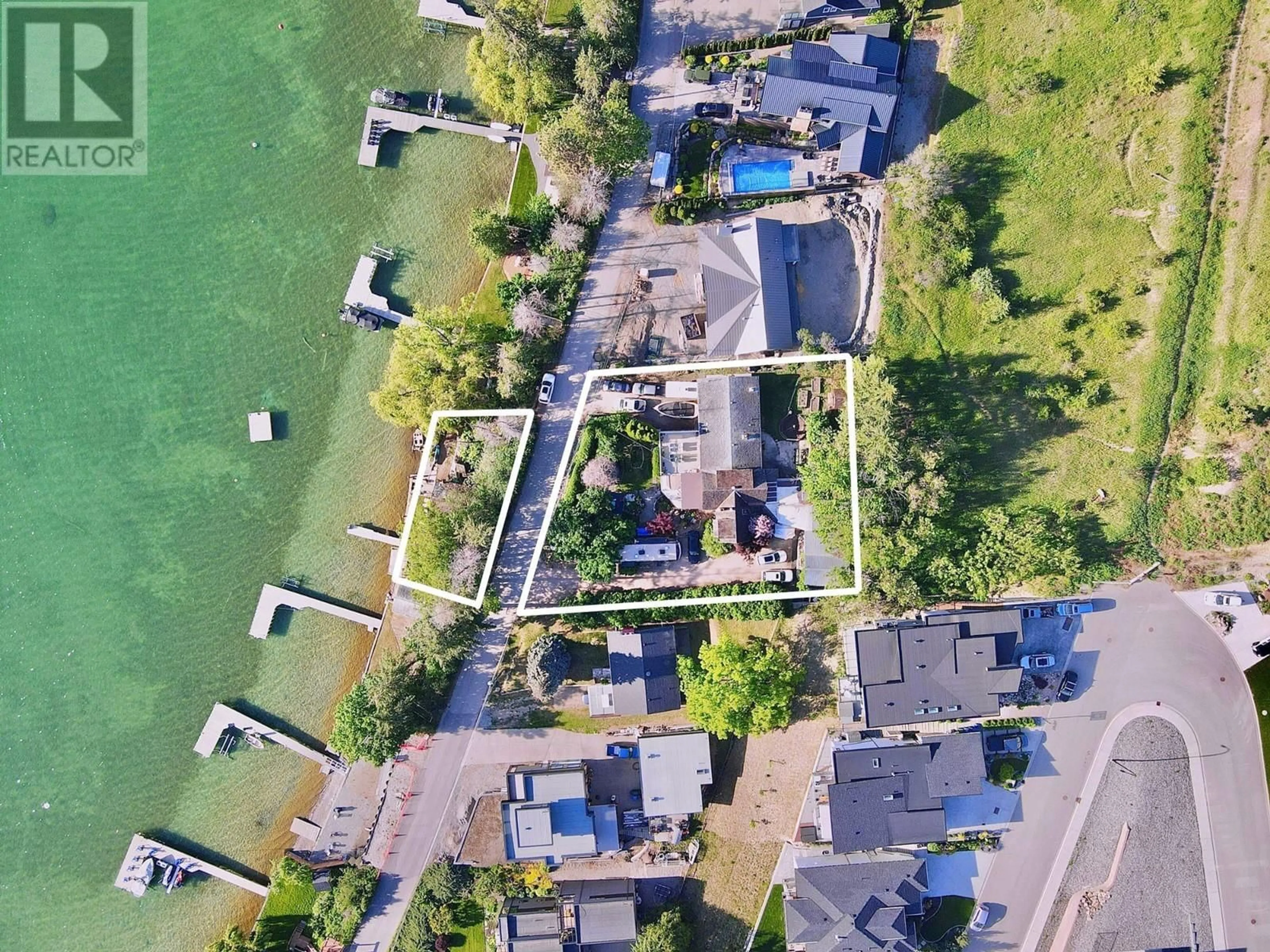 A pic from outside/outdoor area/front of a property/back of a property/a pic from drone, water/lake/river/ocean view for 15911 TRASK ROAD, Lake Country British Columbia V4V2H9