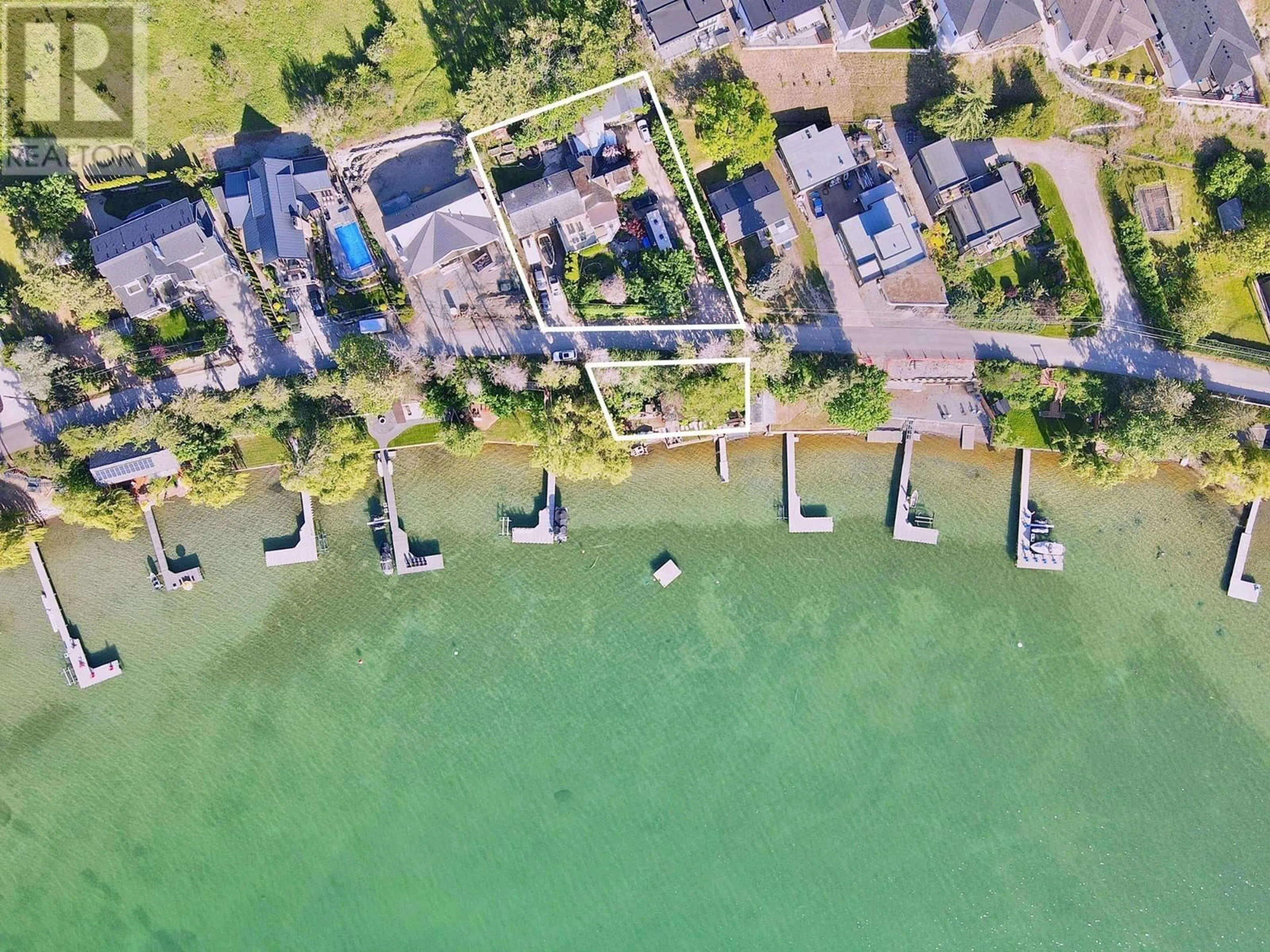 A pic from outside/outdoor area/front of a property/back of a property/a pic from drone, water/lake/river/ocean view for 15911 TRASK ROAD, Lake Country British Columbia V4V2H9