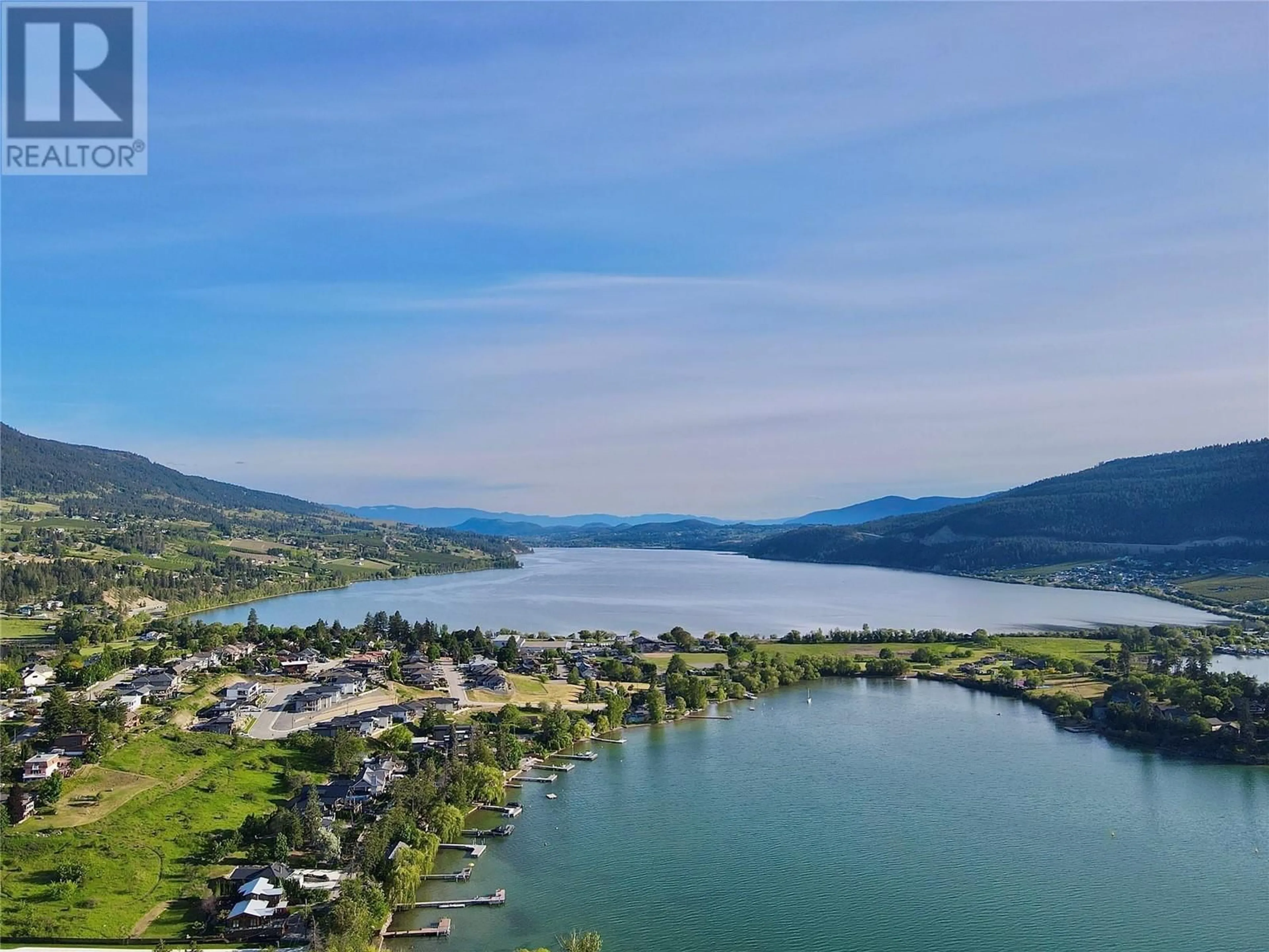 A pic from outside/outdoor area/front of a property/back of a property/a pic from drone, water/lake/river/ocean view for 15911 TRASK ROAD, Lake Country British Columbia V4V2H9