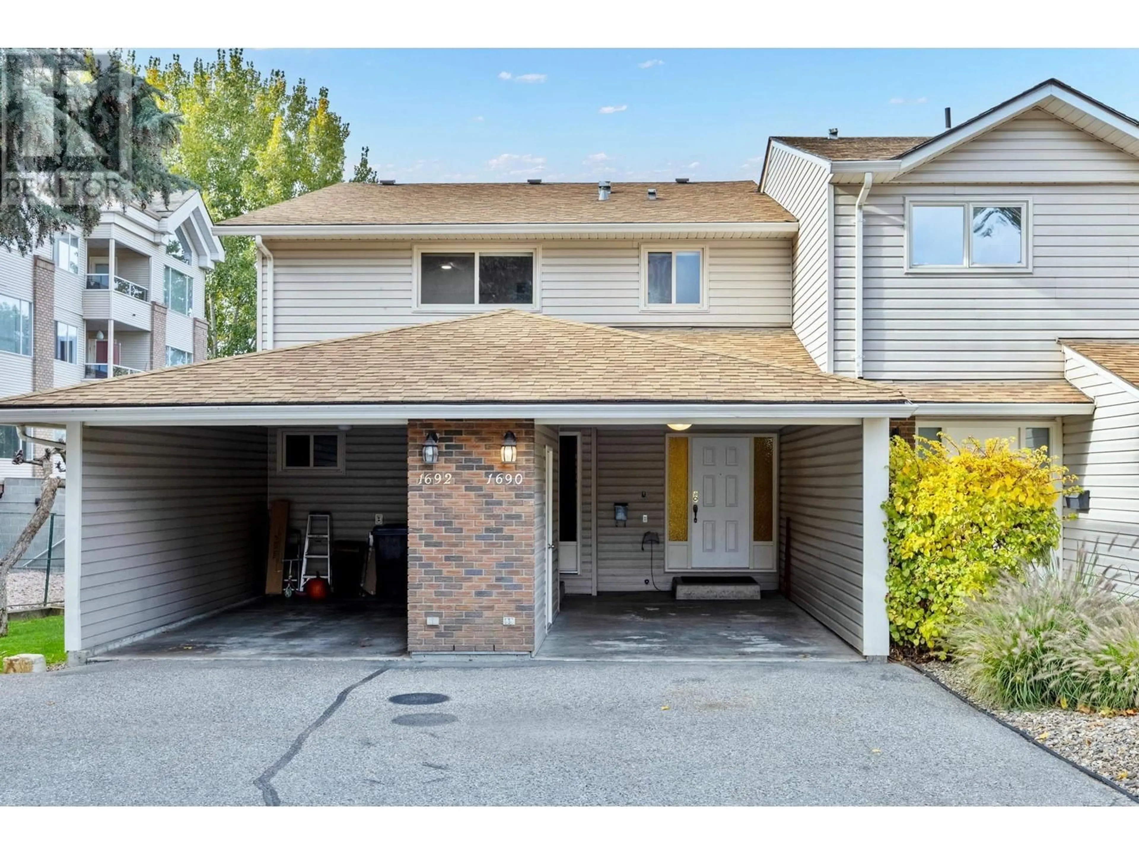 A pic from exterior of the house or condo, the street view for 1690 Thayer Court, Kelowna British Columbia V1Y8M2