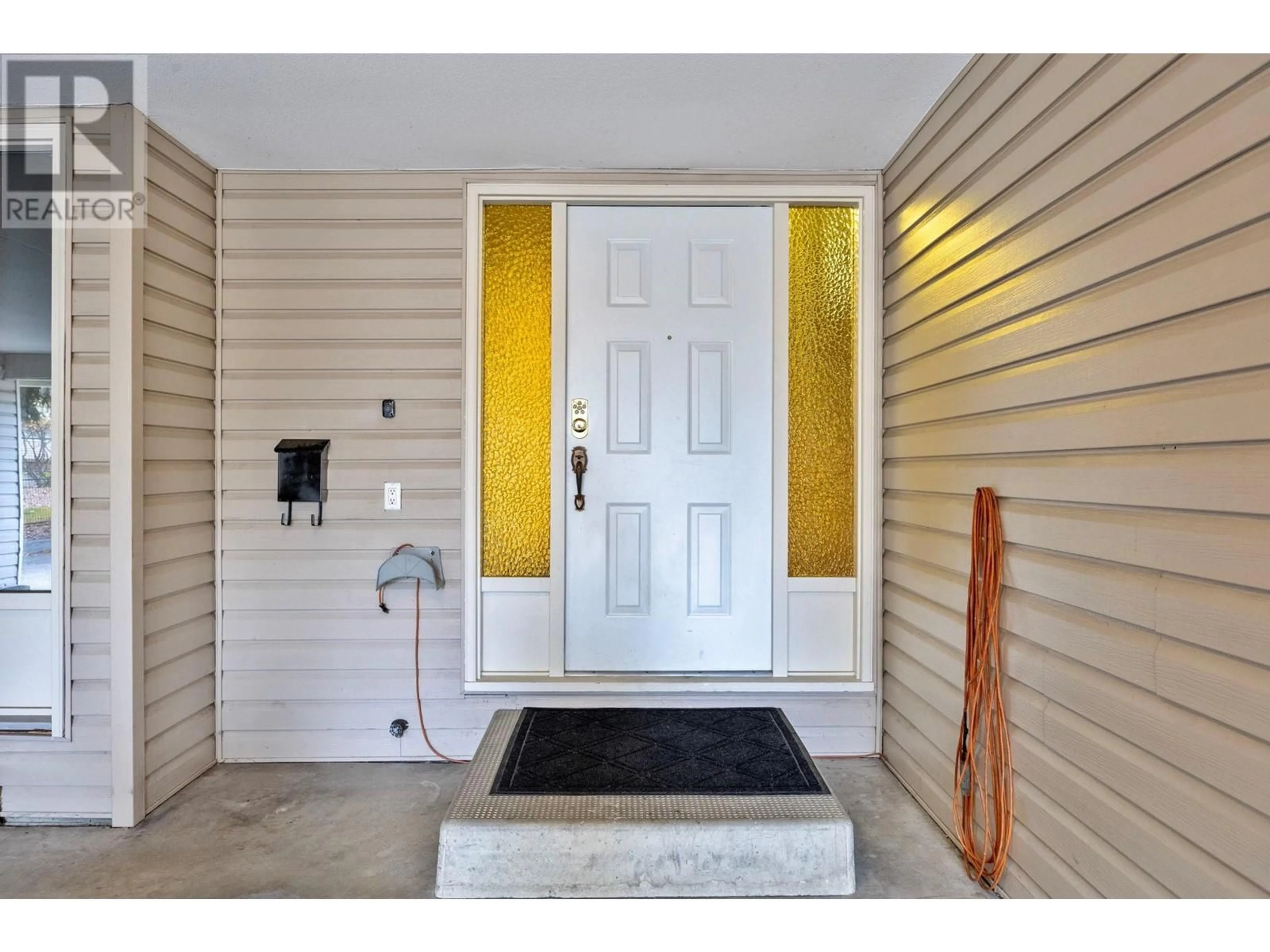 Indoor entryway, wood floors for 1690 Thayer Court, Kelowna British Columbia V1Y8M2