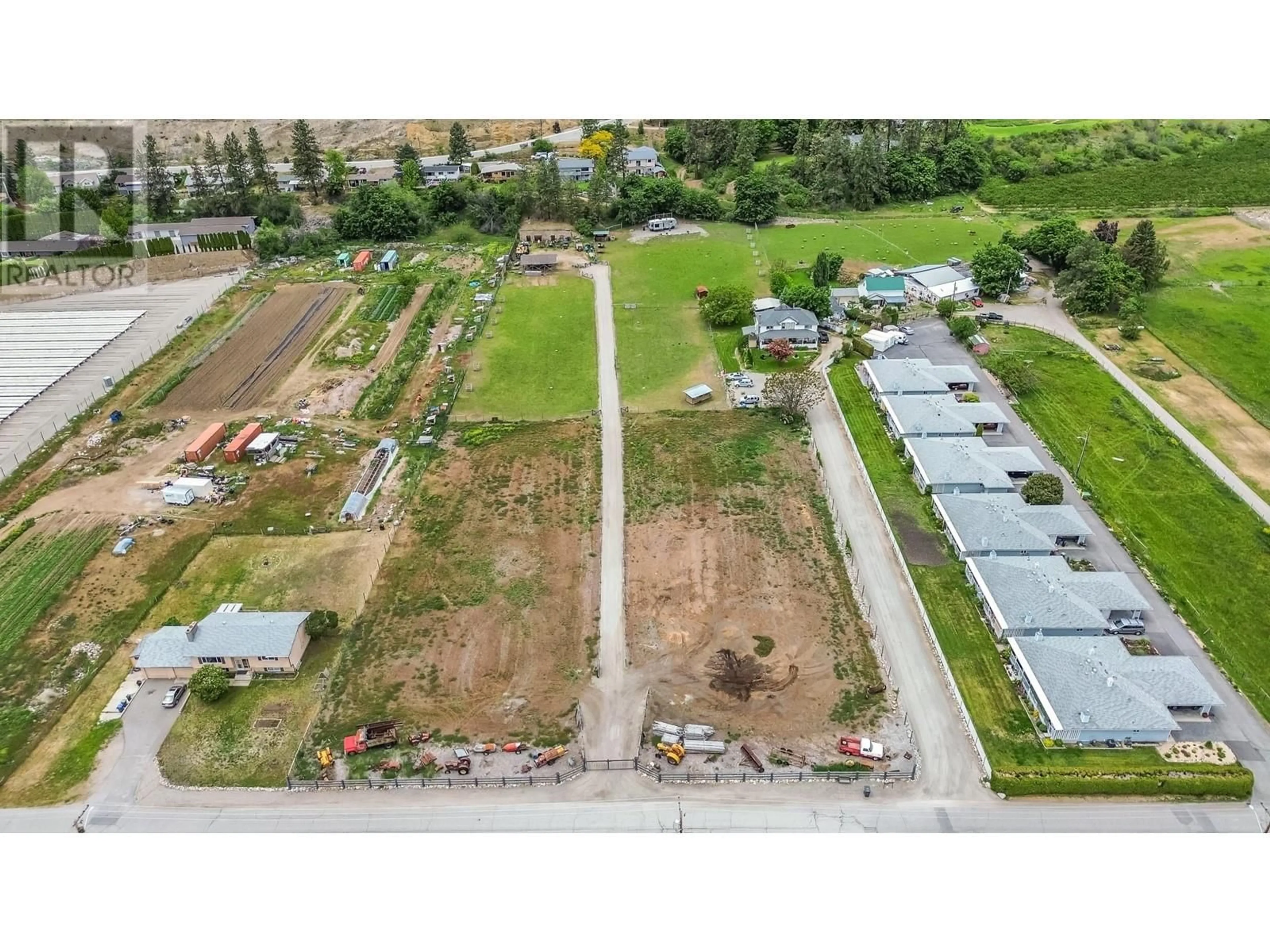 A pic from exterior of the house or condo, the fenced backyard for 14612 Garnet Avenue, Summerland British Columbia V0H1Z0