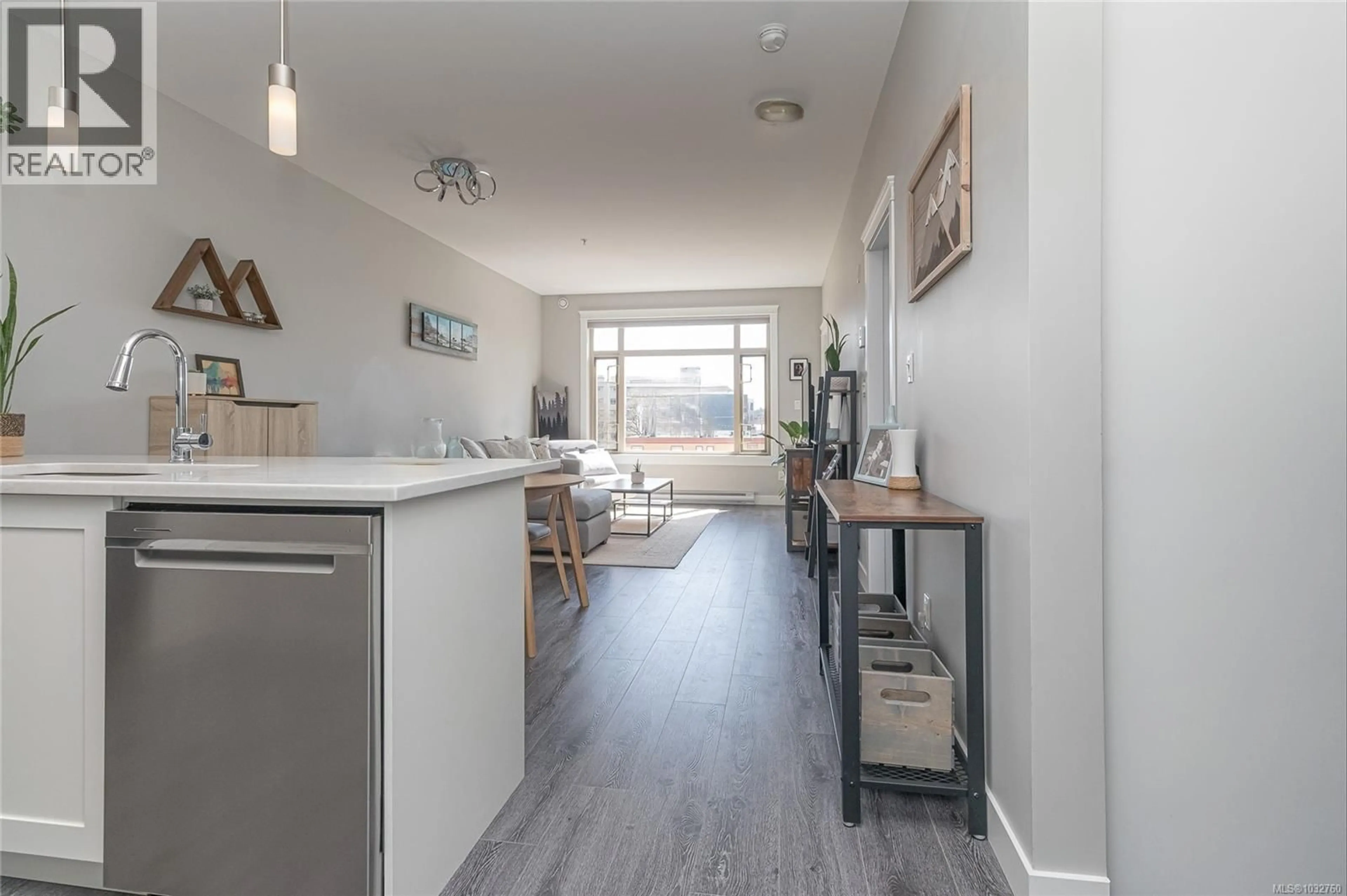 Open concept kitchen, wood/laminate floor for 308 - 844 GOLDSTREAM AVENUE, Langford British Columbia V9B2X7