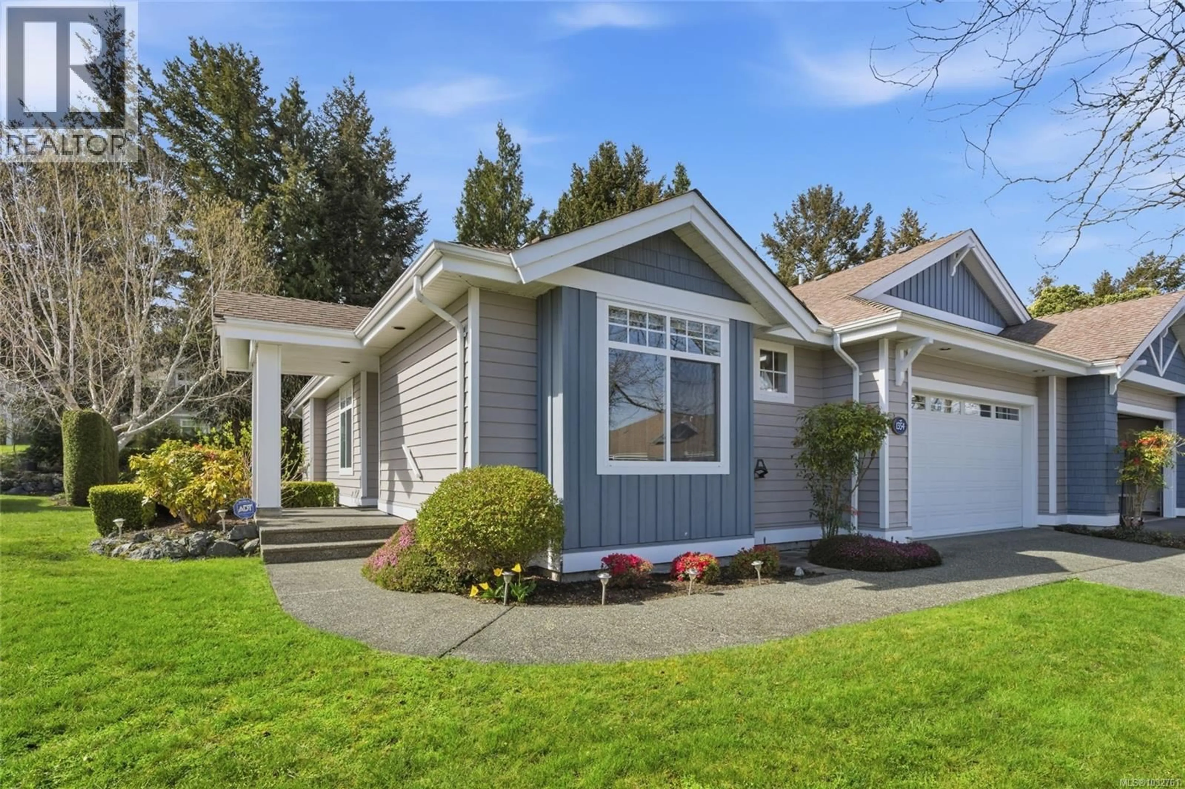 Home with vinyl exterior material, street for 1354 SATURNA DRIVE, Parksville British Columbia V9P2X9