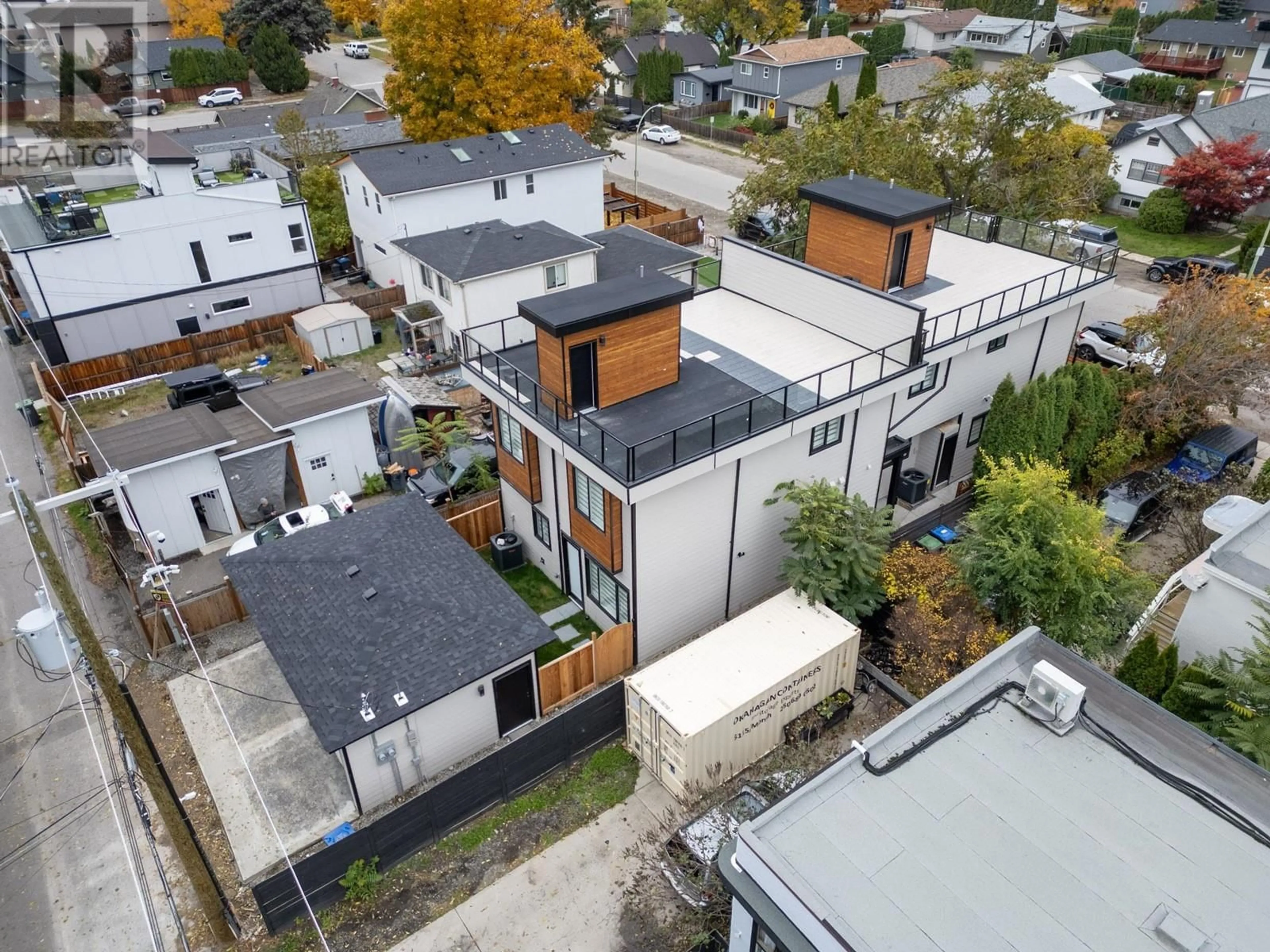 Frontside or backside of a home, the fenced backyard for 954 Fuller Avenue, Kelowna British Columbia V1Y6X4