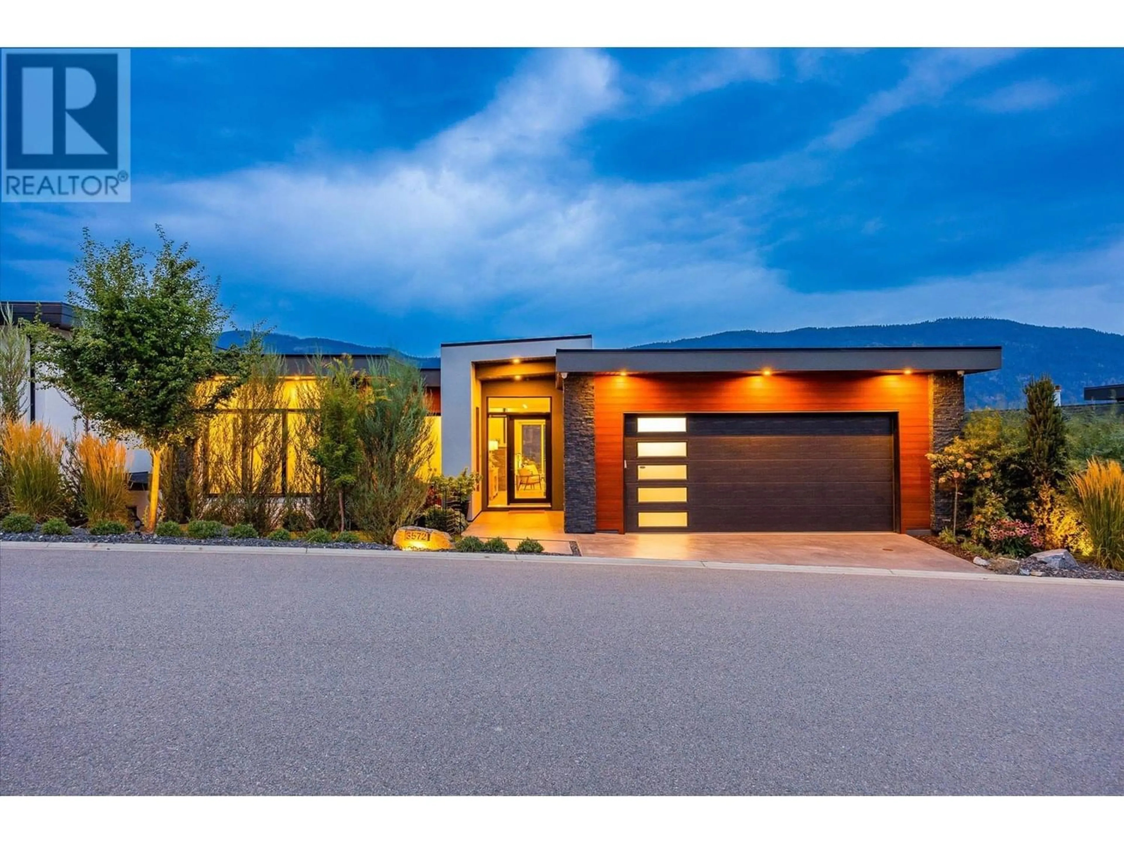 Home with brick exterior material for 3572 Wild Rose Road, Kelowna British Columbia V1V3G1