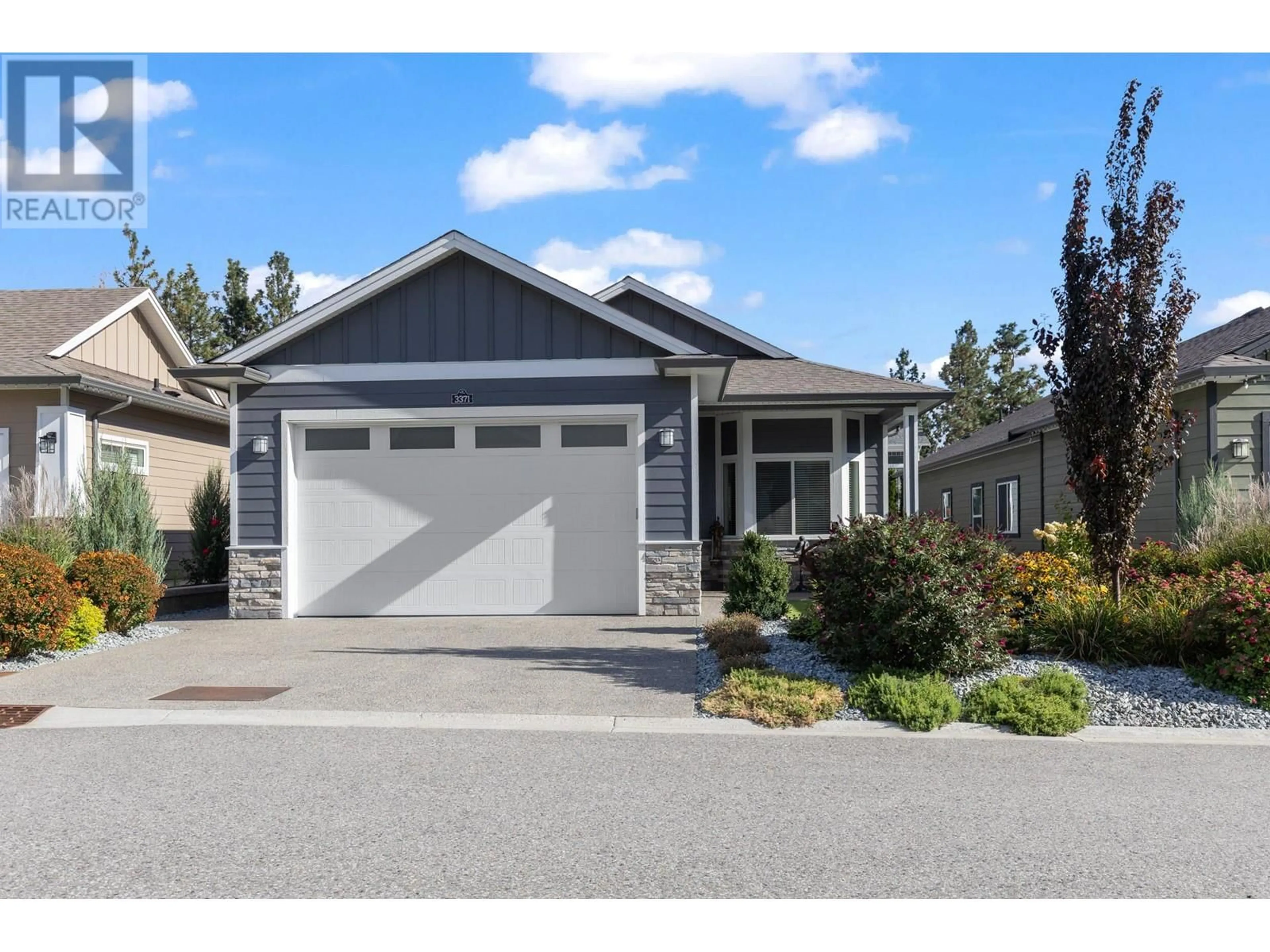 Frontside or backside of a home, the street view for 3371 Ironwood Drive, Westbank British Columbia V4T0A9