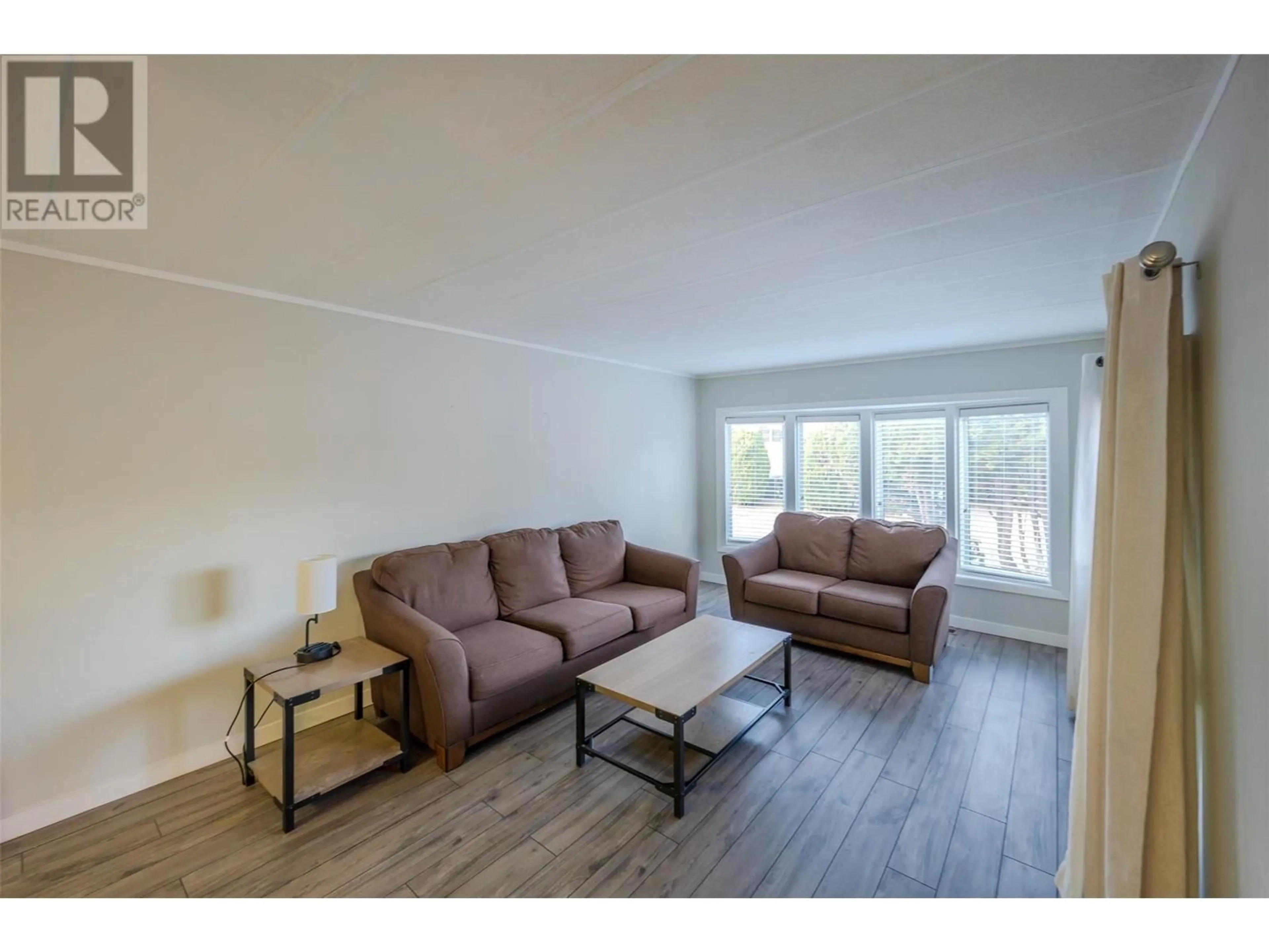 Living room, wood floors for 197 DAUPHIN Avenue Unit# 46, Penticton British Columbia V2A3S3