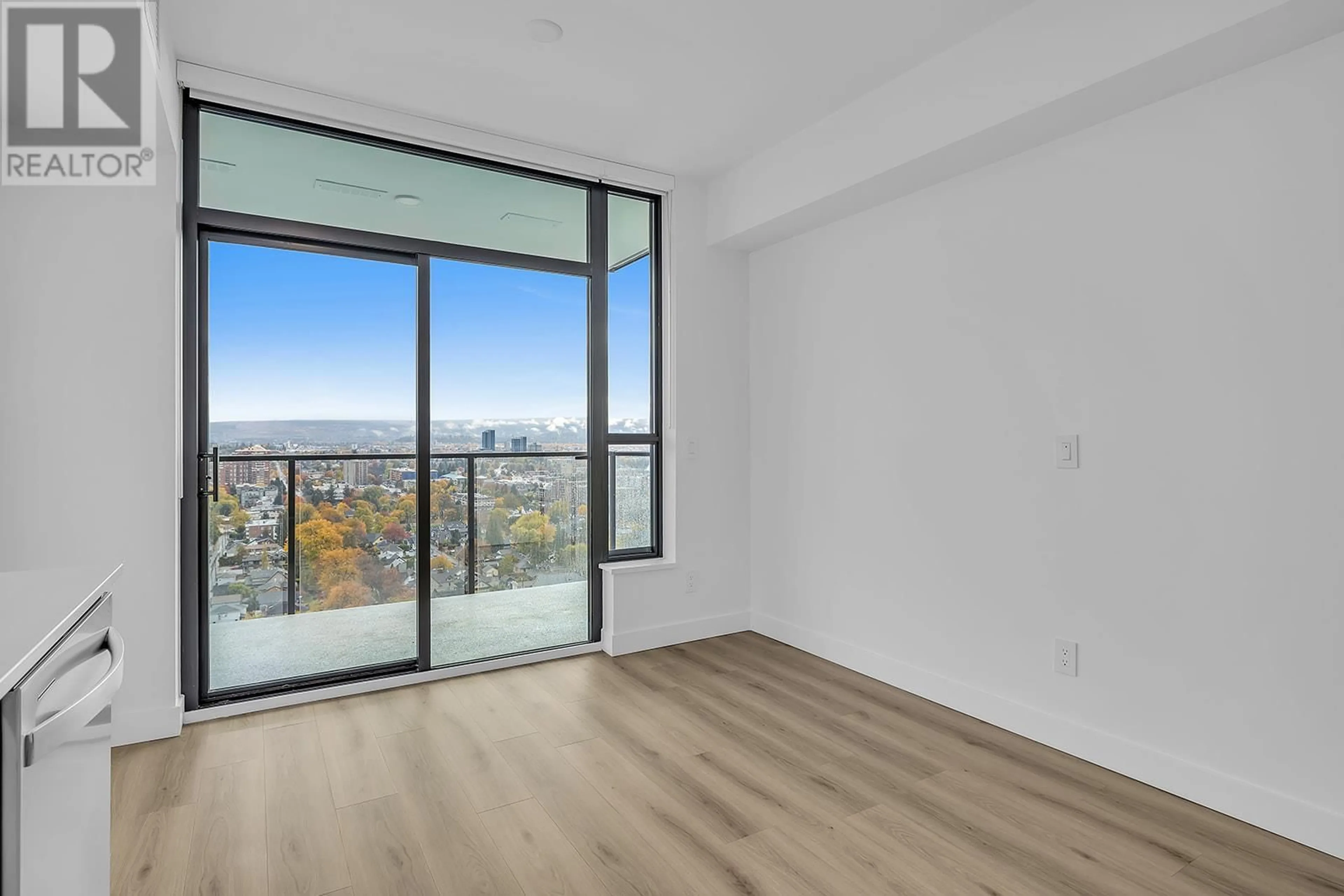 A pic of a room, wood floors for 1488 Bertram Street Unit# 2306, Kelowna British Columbia V1Y6P2