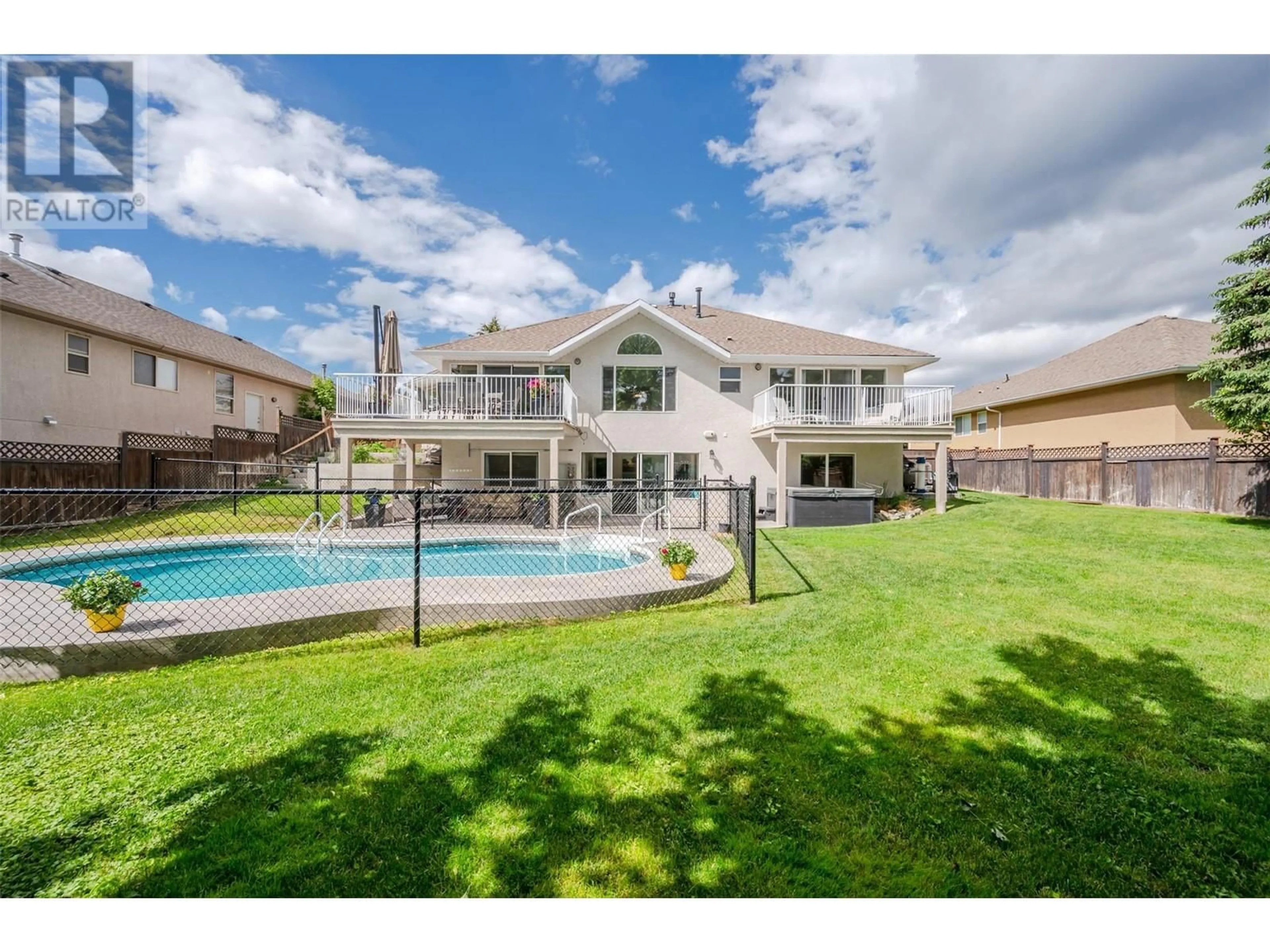 Frontside or backside of a home, the fenced backyard for 2011 Sandpiper Lane, Penticton British Columbia V2A8Y7