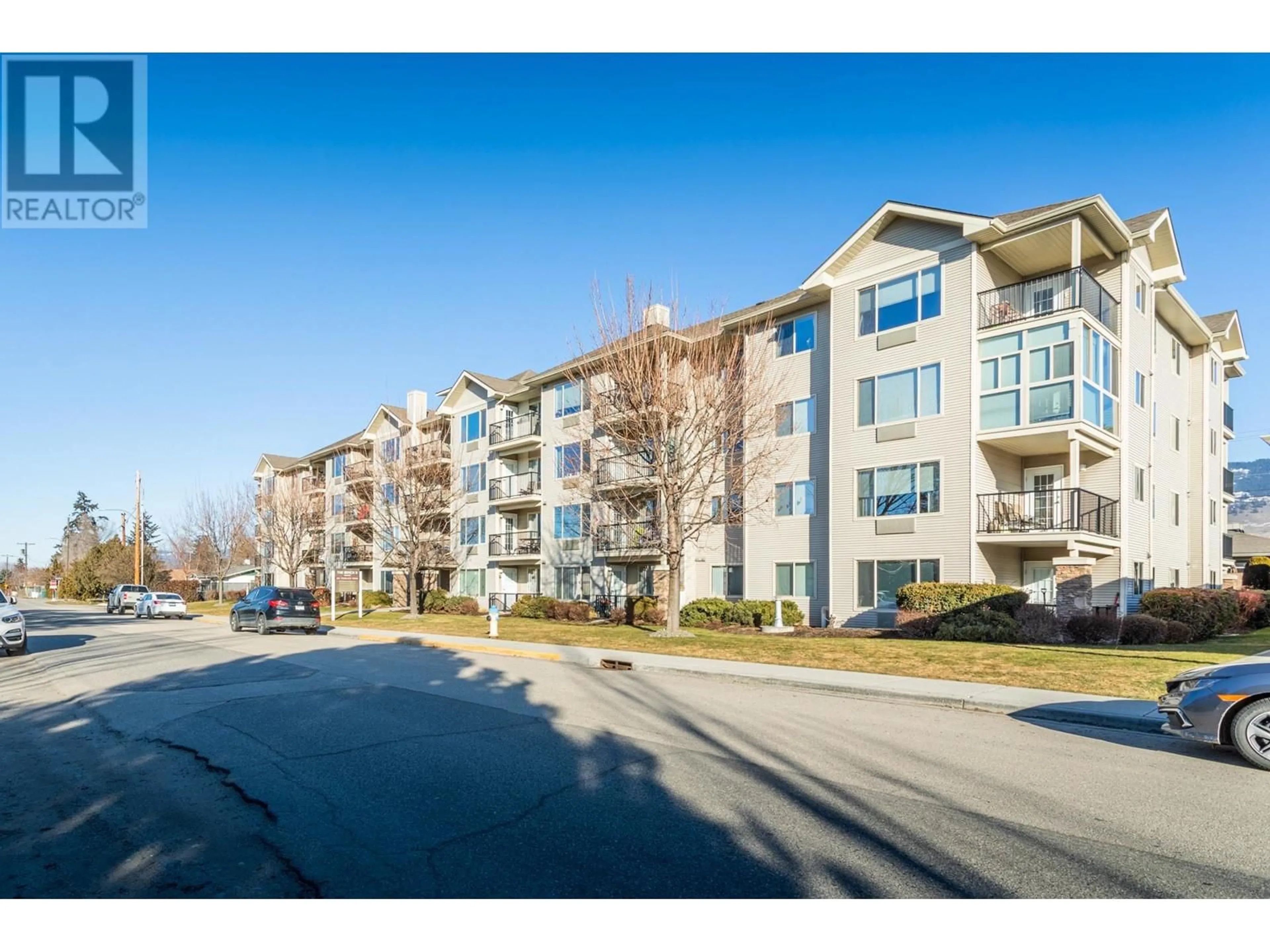 A pic from exterior of the house or condo, the street view for 265 Froelich Road Unit# 105, Kelowna British Columbia V1X3M6