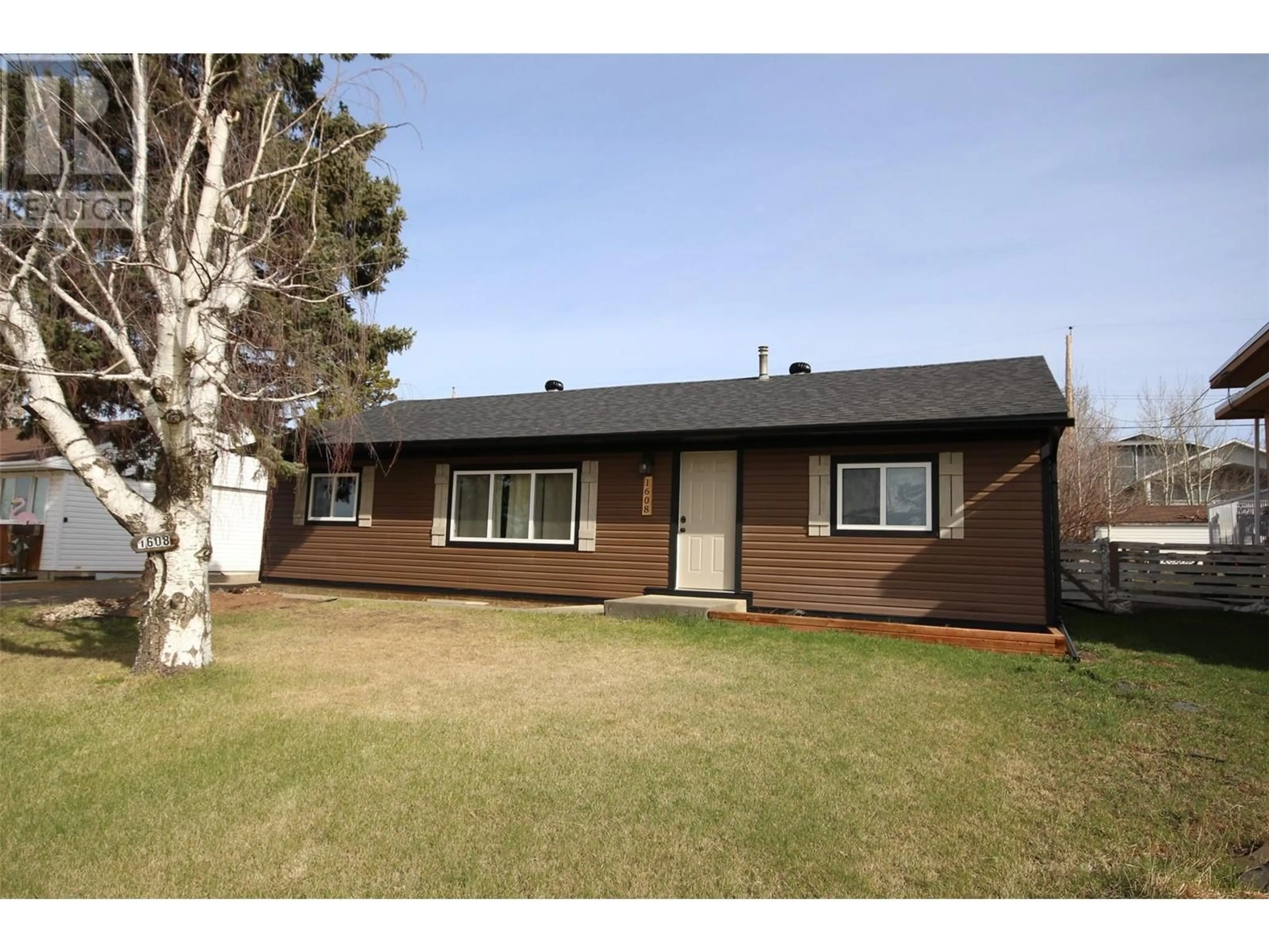 Frontside or backside of a home, cottage for 1608 95 Avenue, Dawson Creek British Columbia V1G1K1