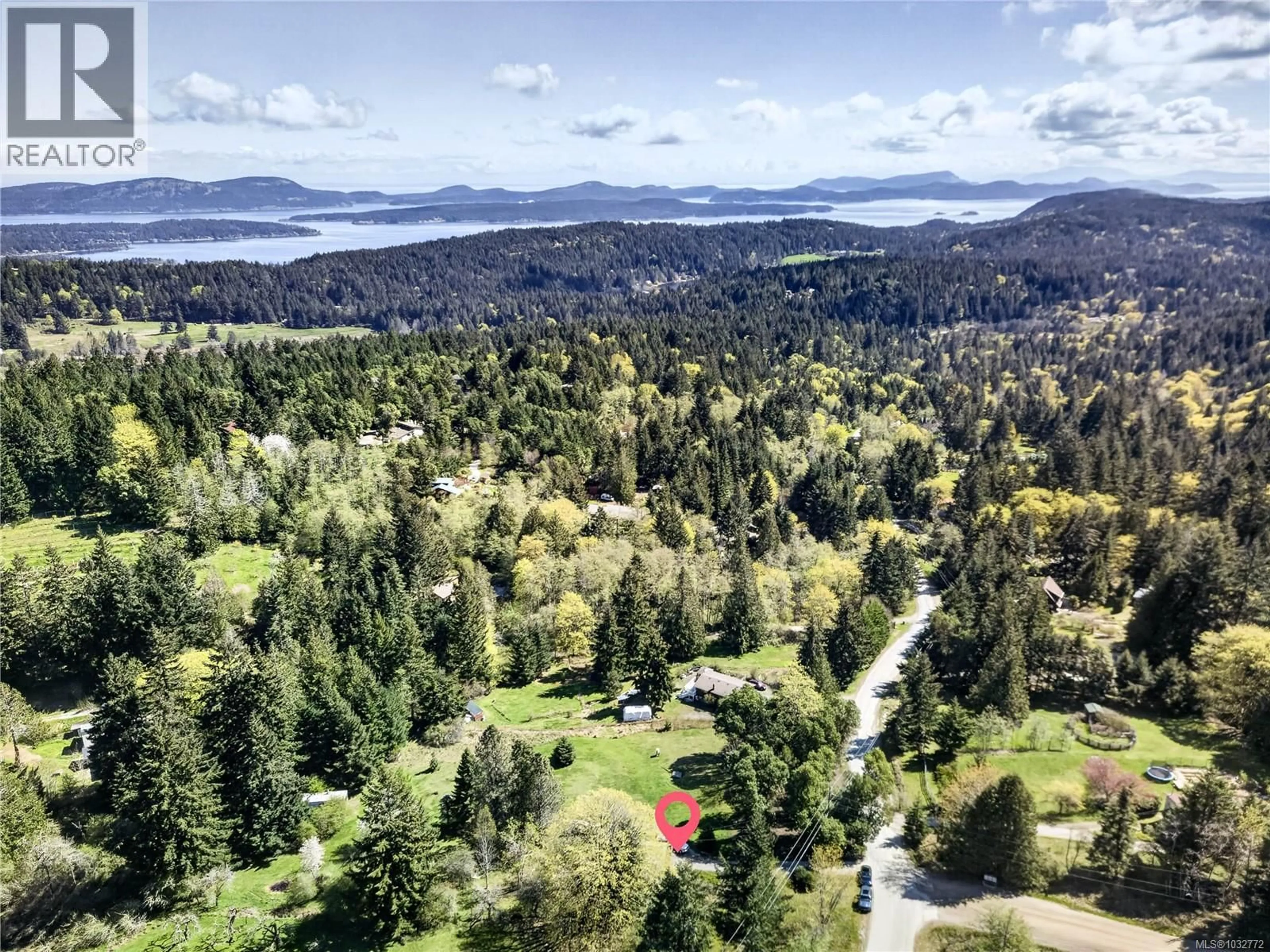 A pic from outside/outdoor area/front of a property/back of a property/a pic from drone, forest/trees view for 456 DUKES ROAD, Salt Spring British Columbia V8K2B6