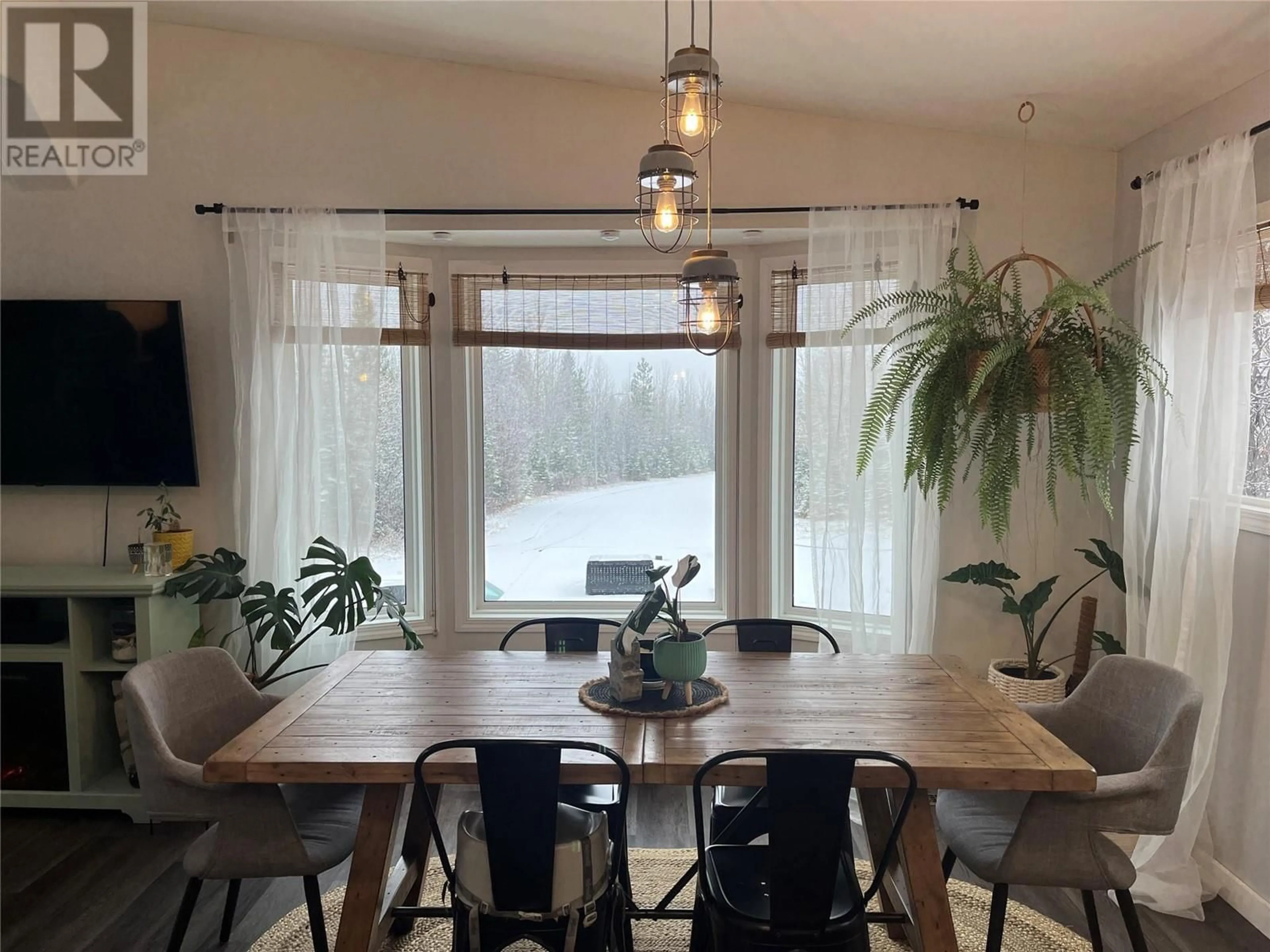 Dining room, wood floors, cottage for 224 Wapiti Crescent, Tumbler Ridge British Columbia V0C2W0