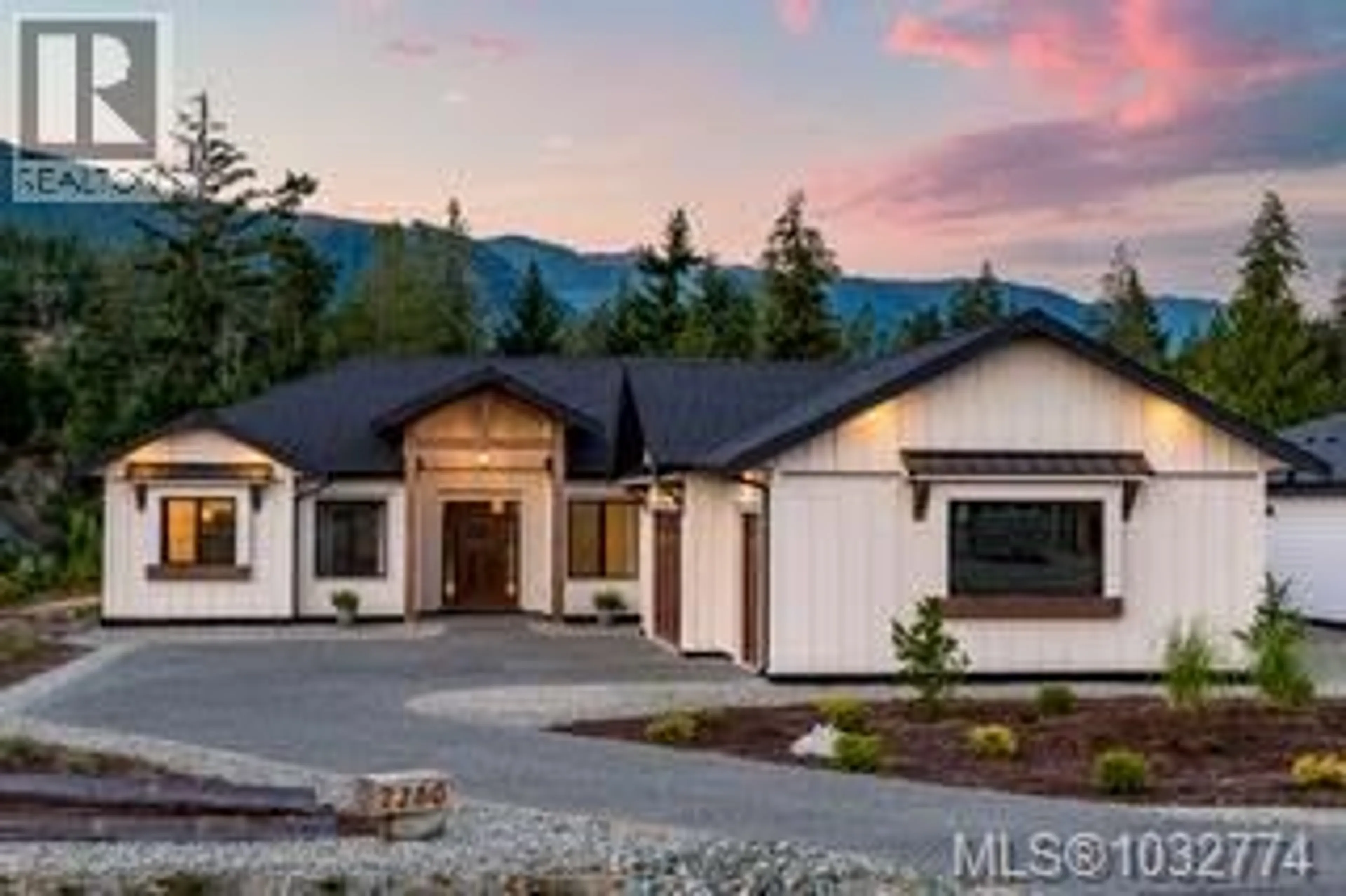 Home with vinyl exterior material, mountain view for 7260 LAKEFRONT DRIVE, Lake Cowichan British Columbia V0R3E1