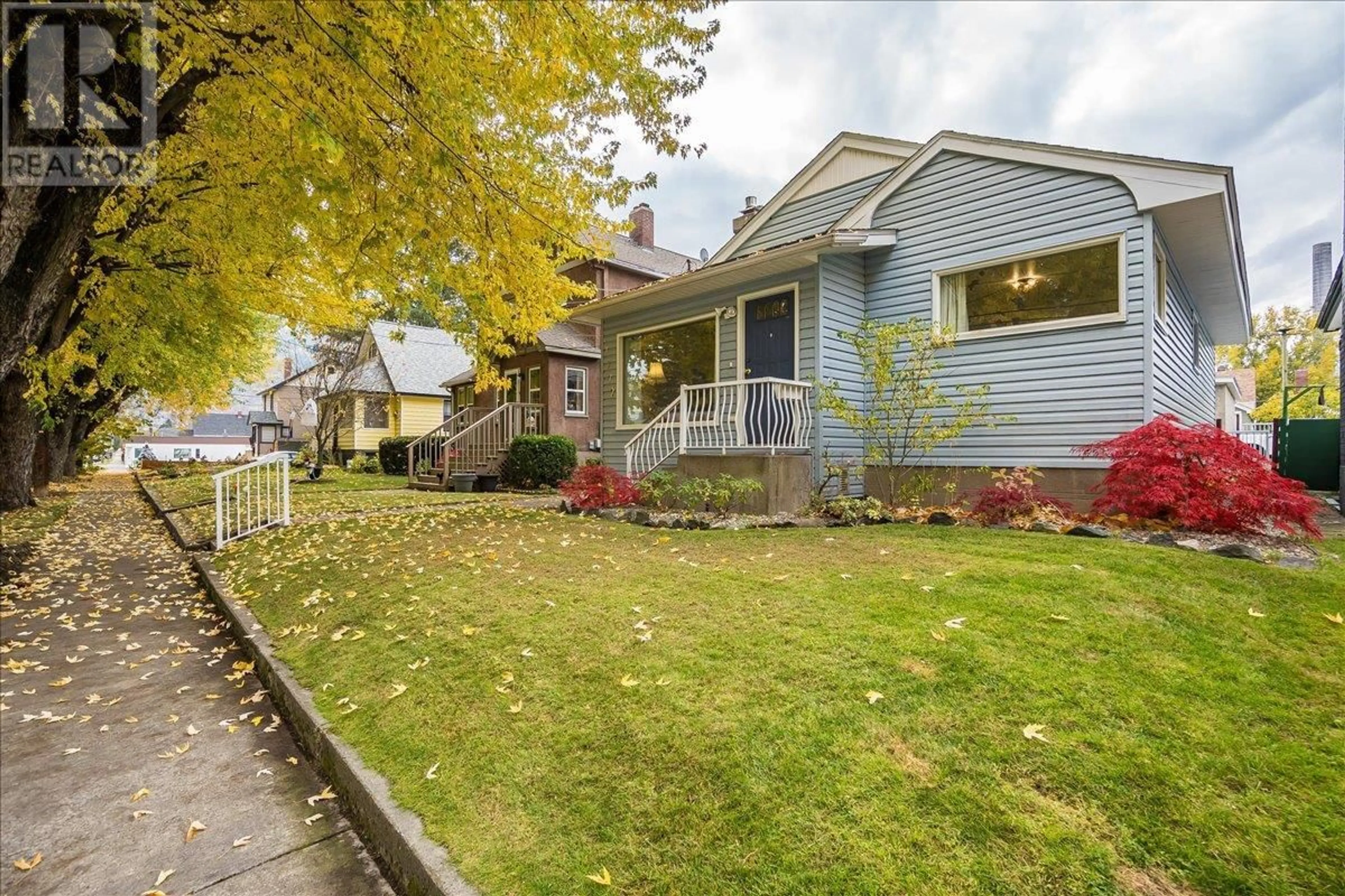 Frontside or backside of a home, the fenced backyard for 1172 Second Avenue, Trail British Columbia V1R1L4