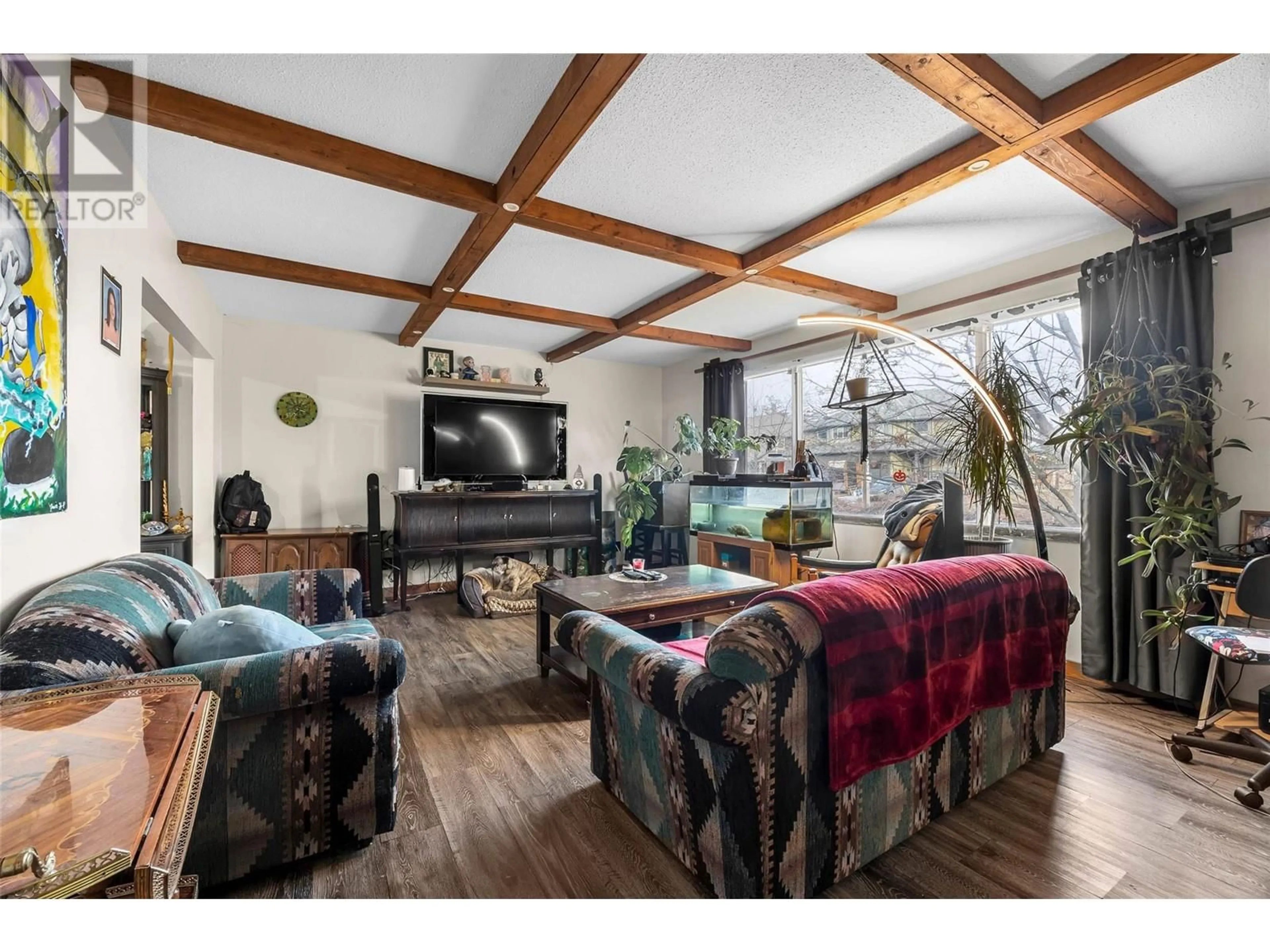 Living room with furniture, wood/laminate floor for 520 SINGH STREET, Kamloops British Columbia V2B5C2