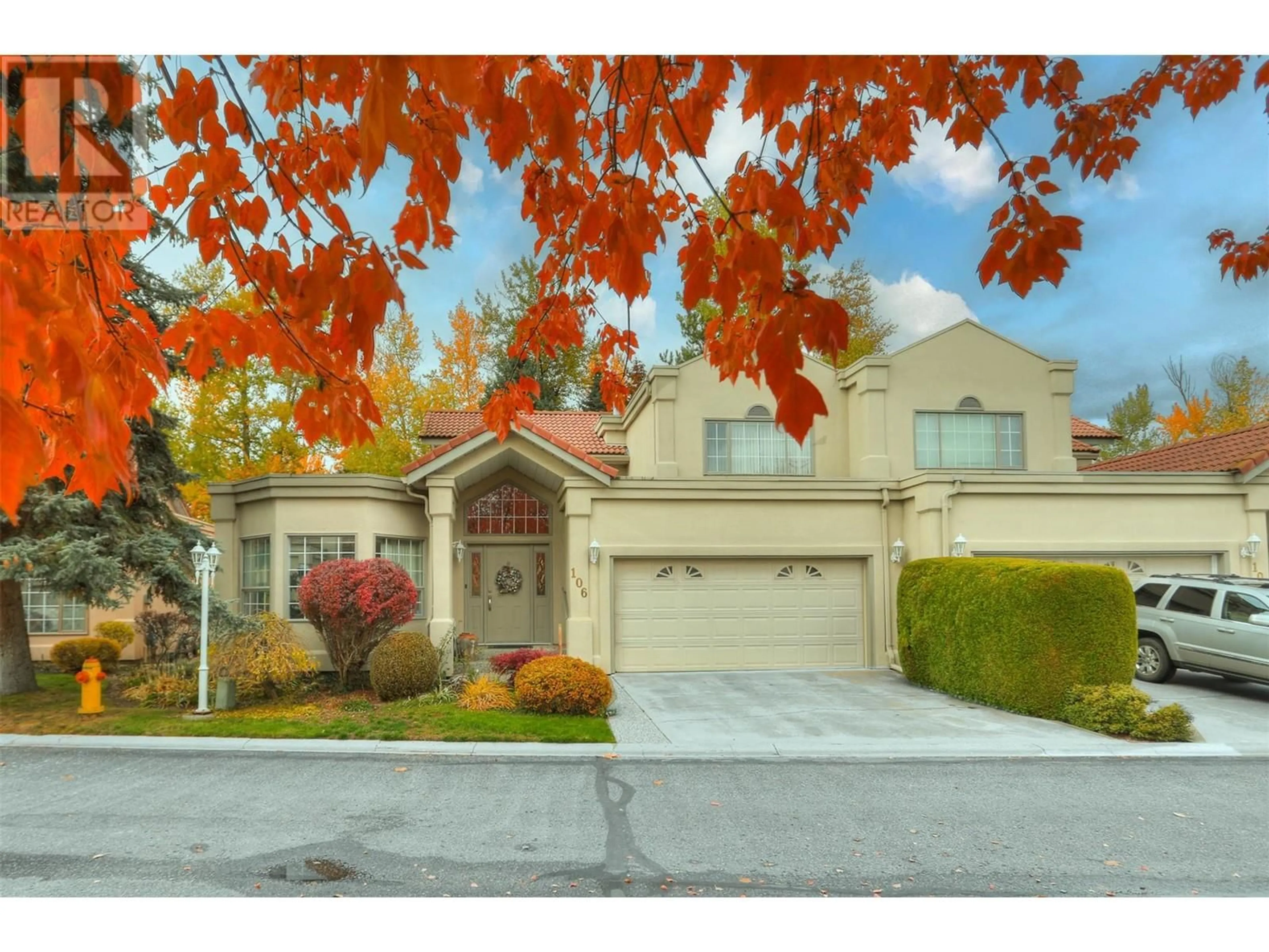 Frontside or backside of a home, the street view for 650 Lexington Drive Unit# 106, Kelowna British Columbia V1W3B6