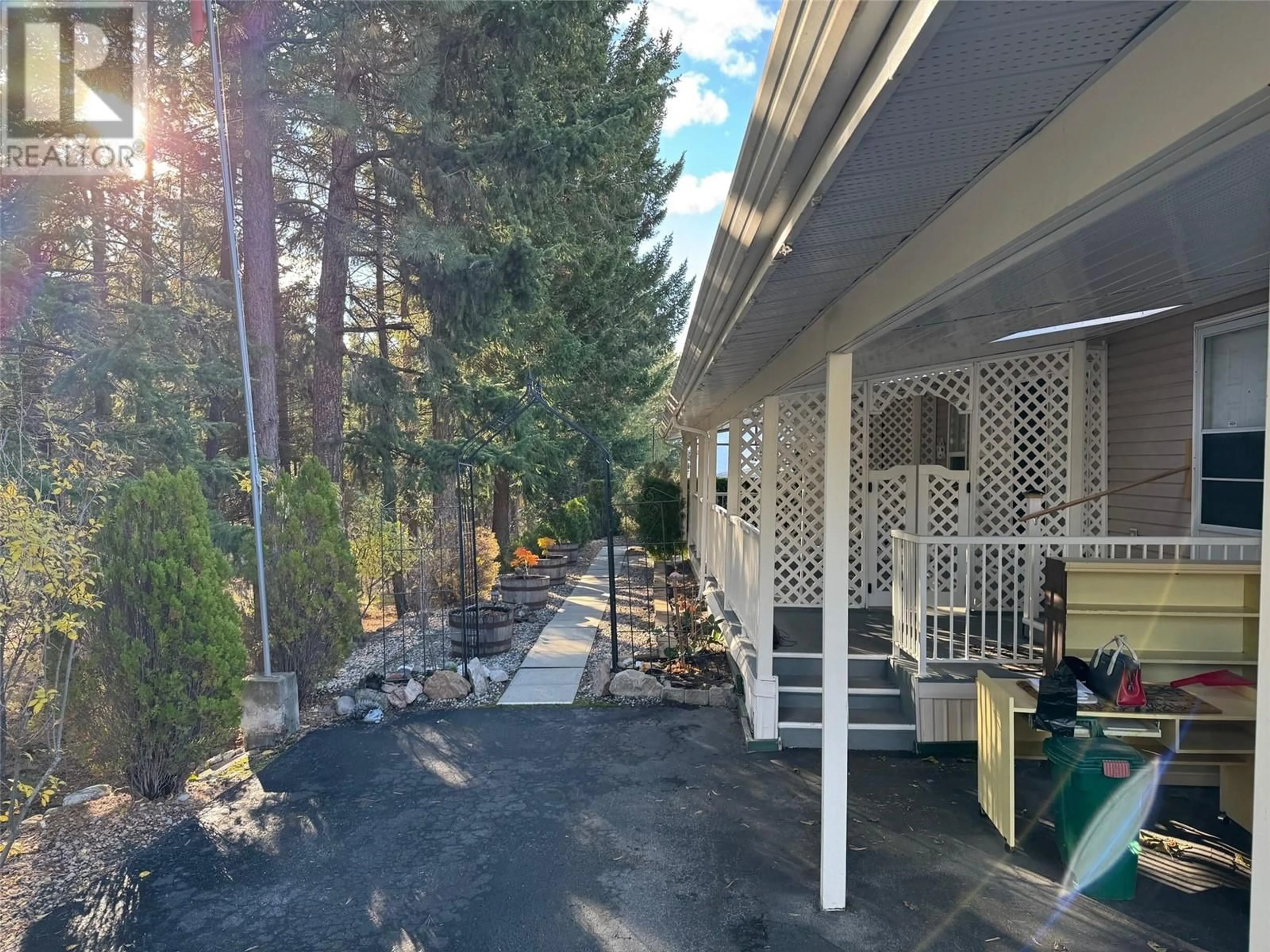 Patio, the fenced backyard for 1850 Shannon Lake Road Unit# 101, West Kelowna British Columbia V4T2Y8