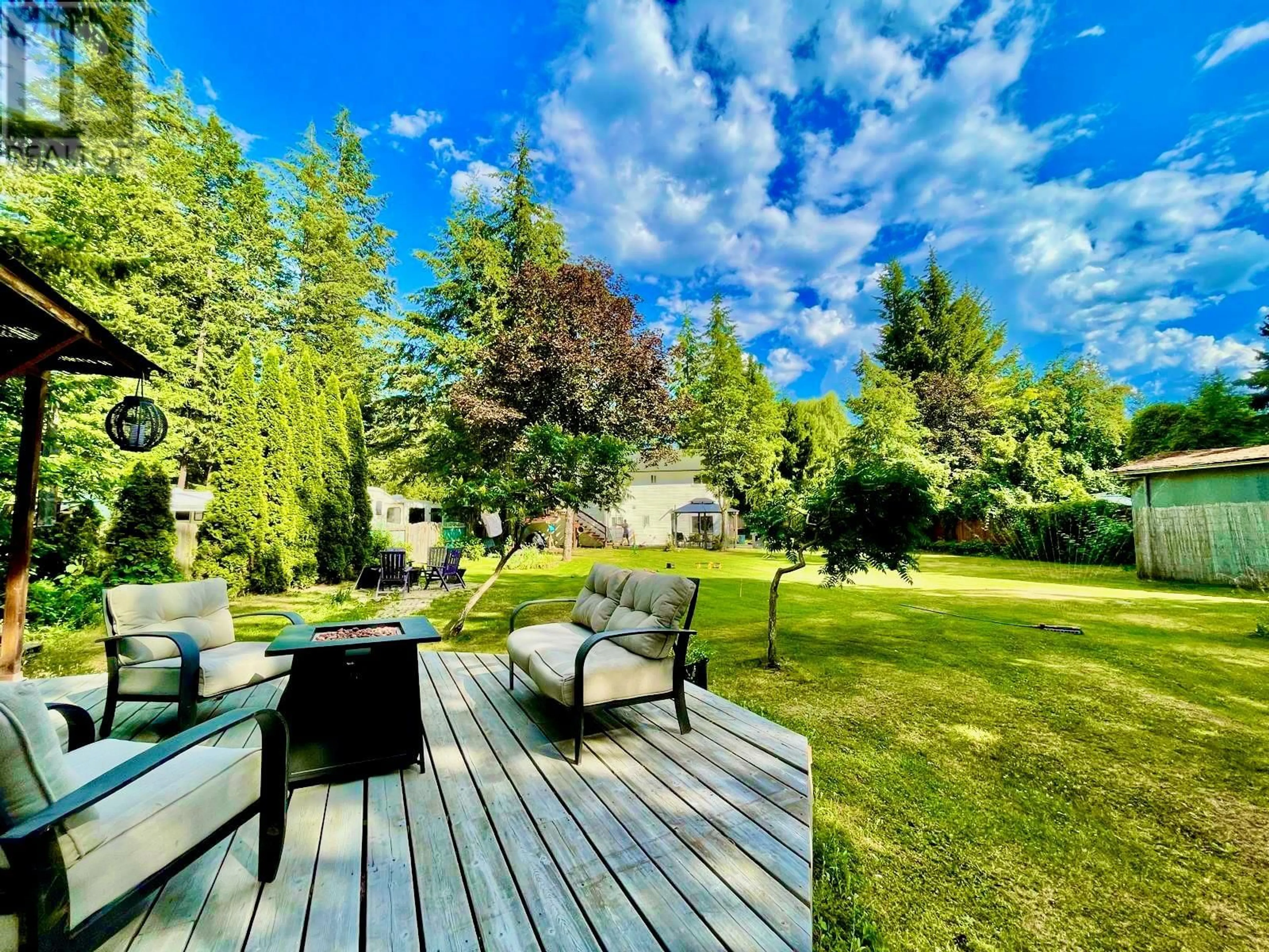 A pic from outside/outdoor area/front of a property/back of a property/a pic from drone, forest/trees view for 4179 ASHE CRESCENT, Scotch Creek British Columbia V0E1M5