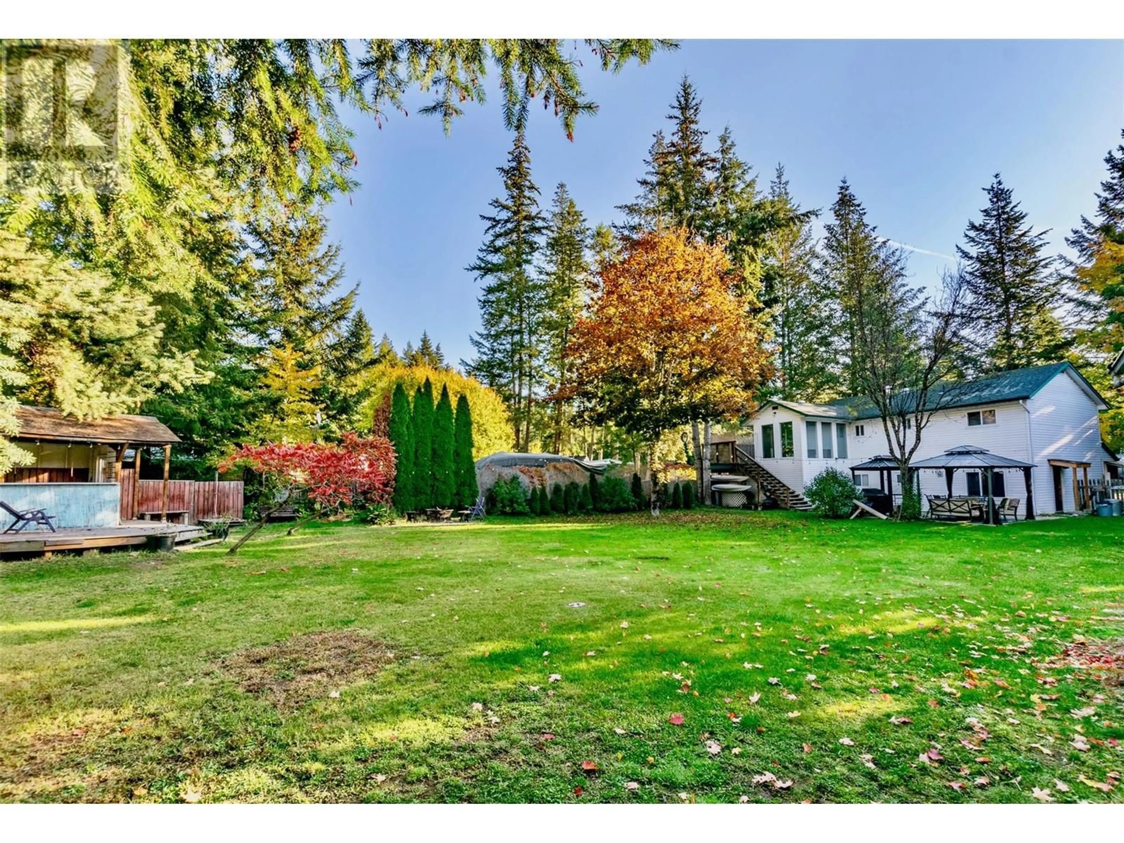 A pic from outside/outdoor area/front of a property/back of a property/a pic from drone, forest/trees view for 4179 ASHE CRESCENT, Scotch Creek British Columbia V0E1M5