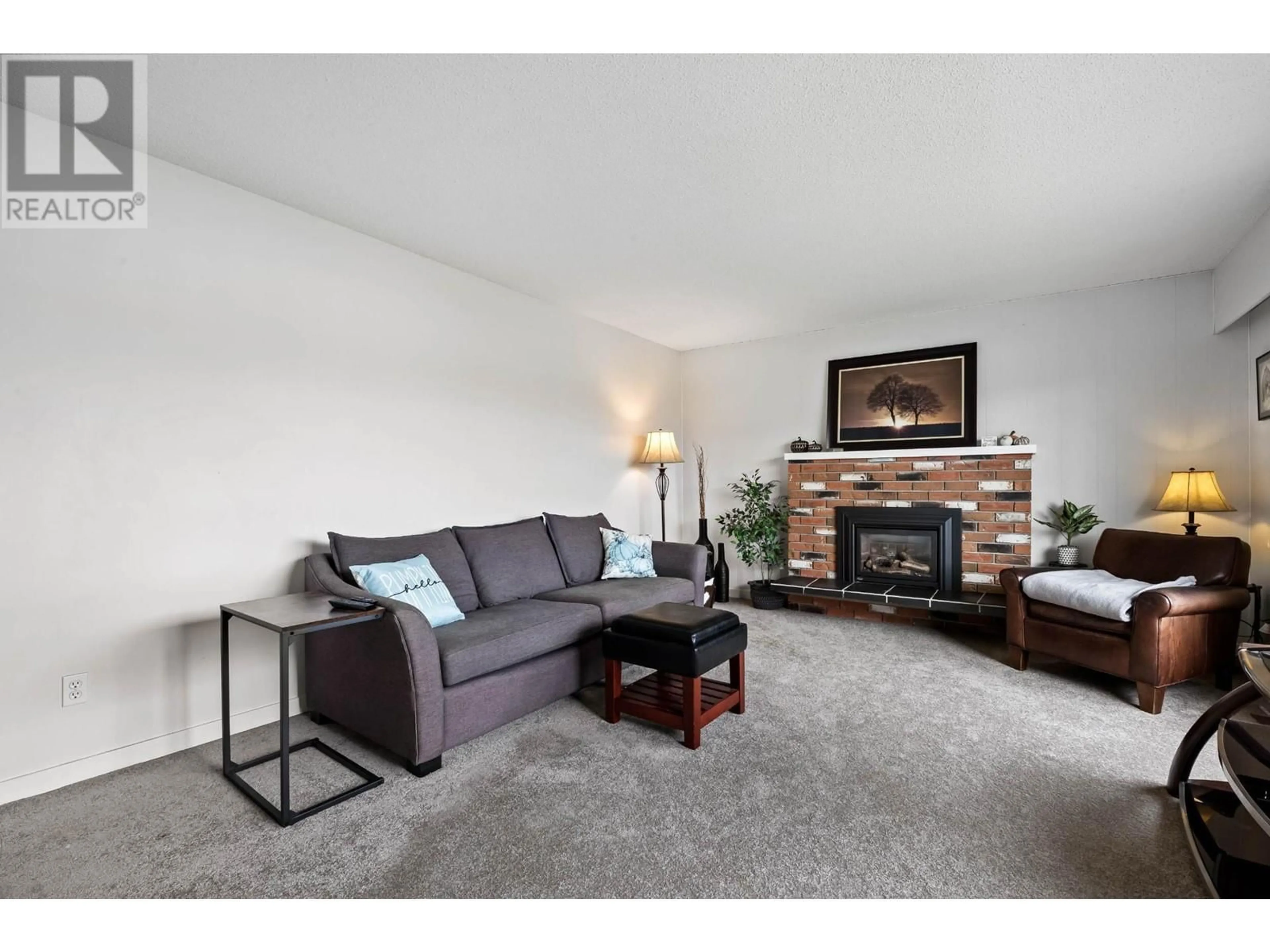 Living room, carpet floors for 525 BLANCHE Street, Kamloops British Columbia V2H1T7