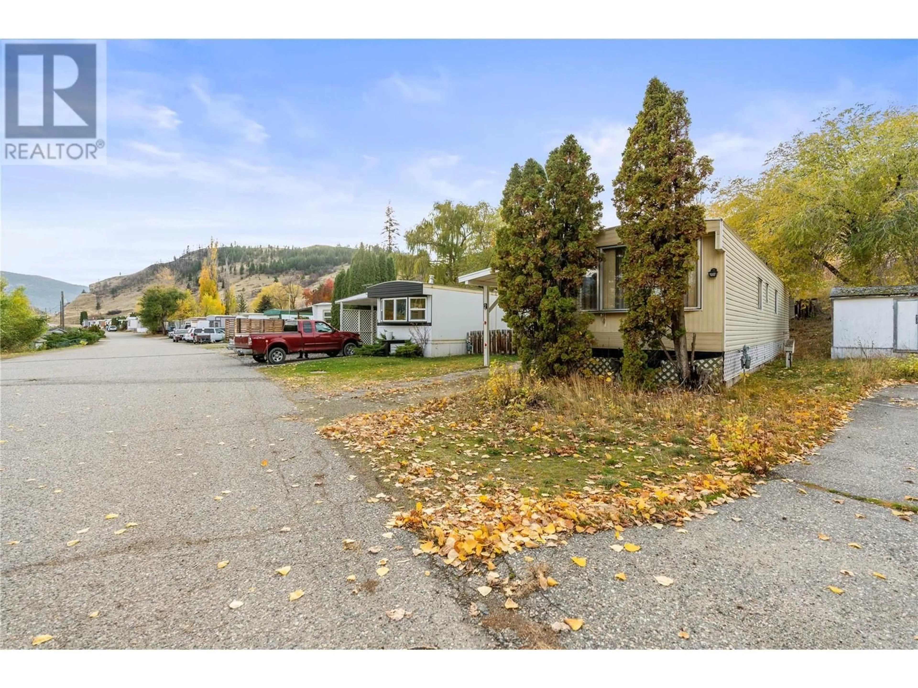 A pic from exterior of the house or condo, the street view for 8508 Clerke Road Unit# 2, Vernon British Columbia V1B1W2