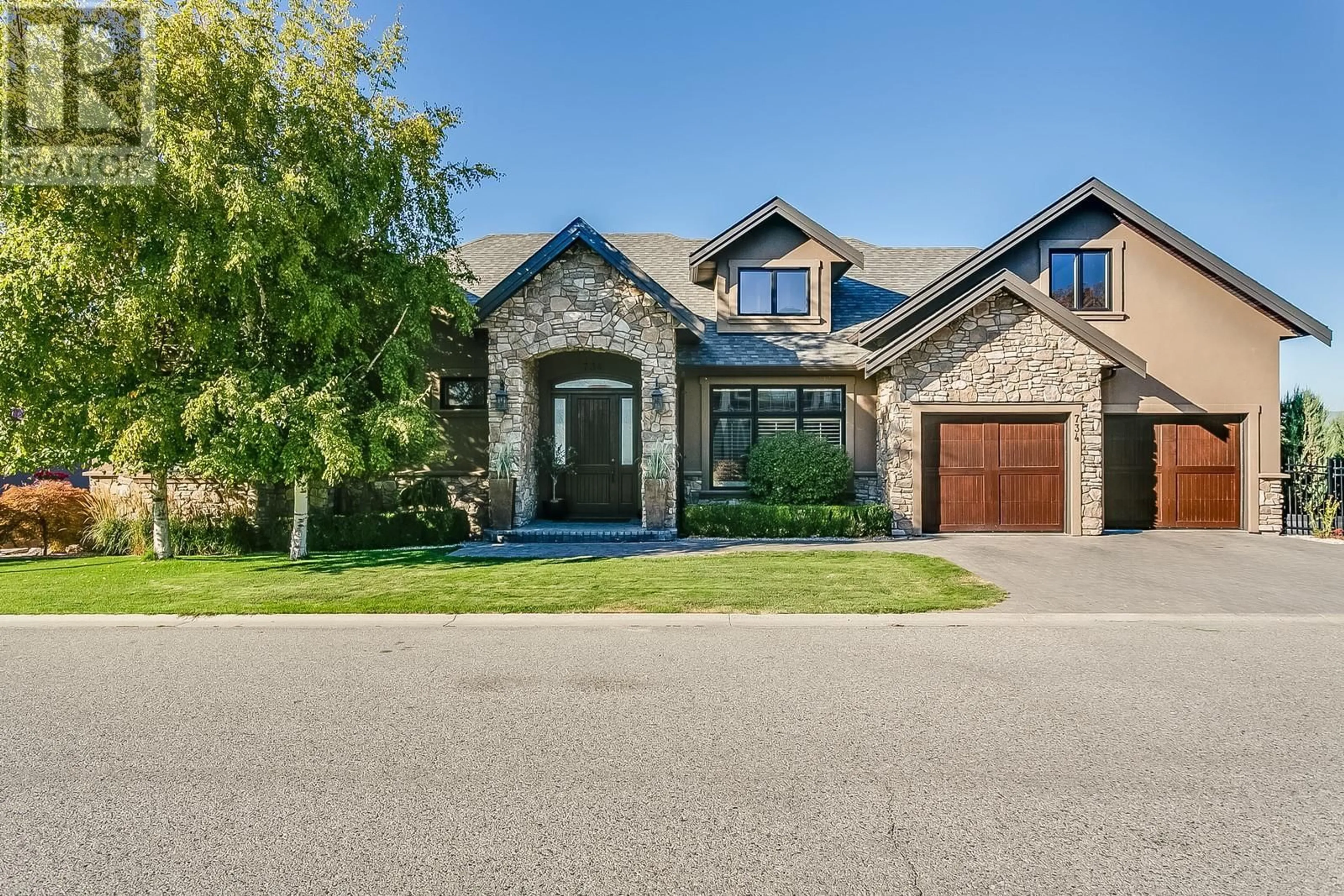 Home with brick exterior material for 734 Kuipers Crescent, Kelowna British Columbia V1W5H4