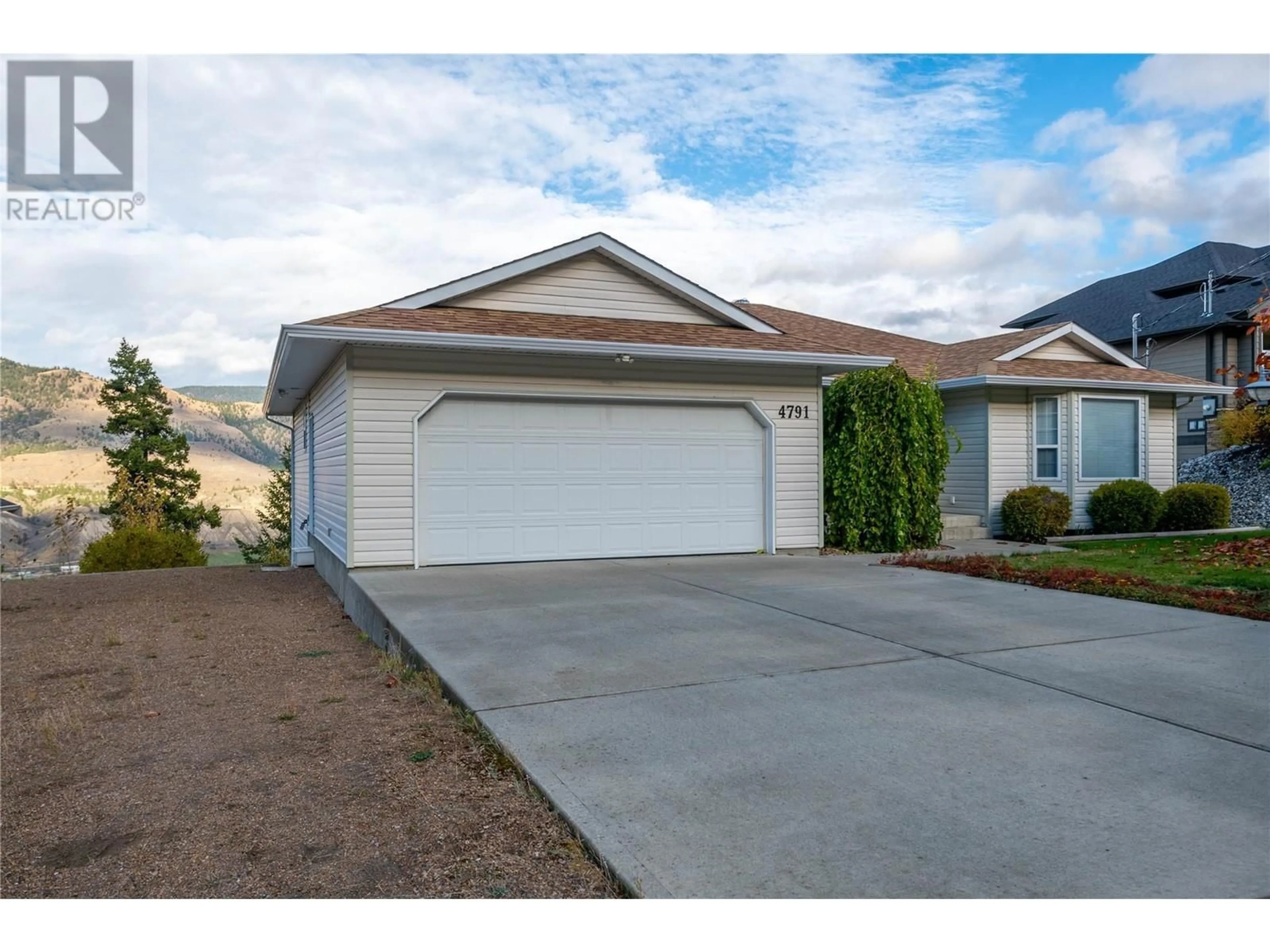 Frontside or backside of a home, the street view for 4791 Uplands Drive, Kamloops British Columbia V2C6S9