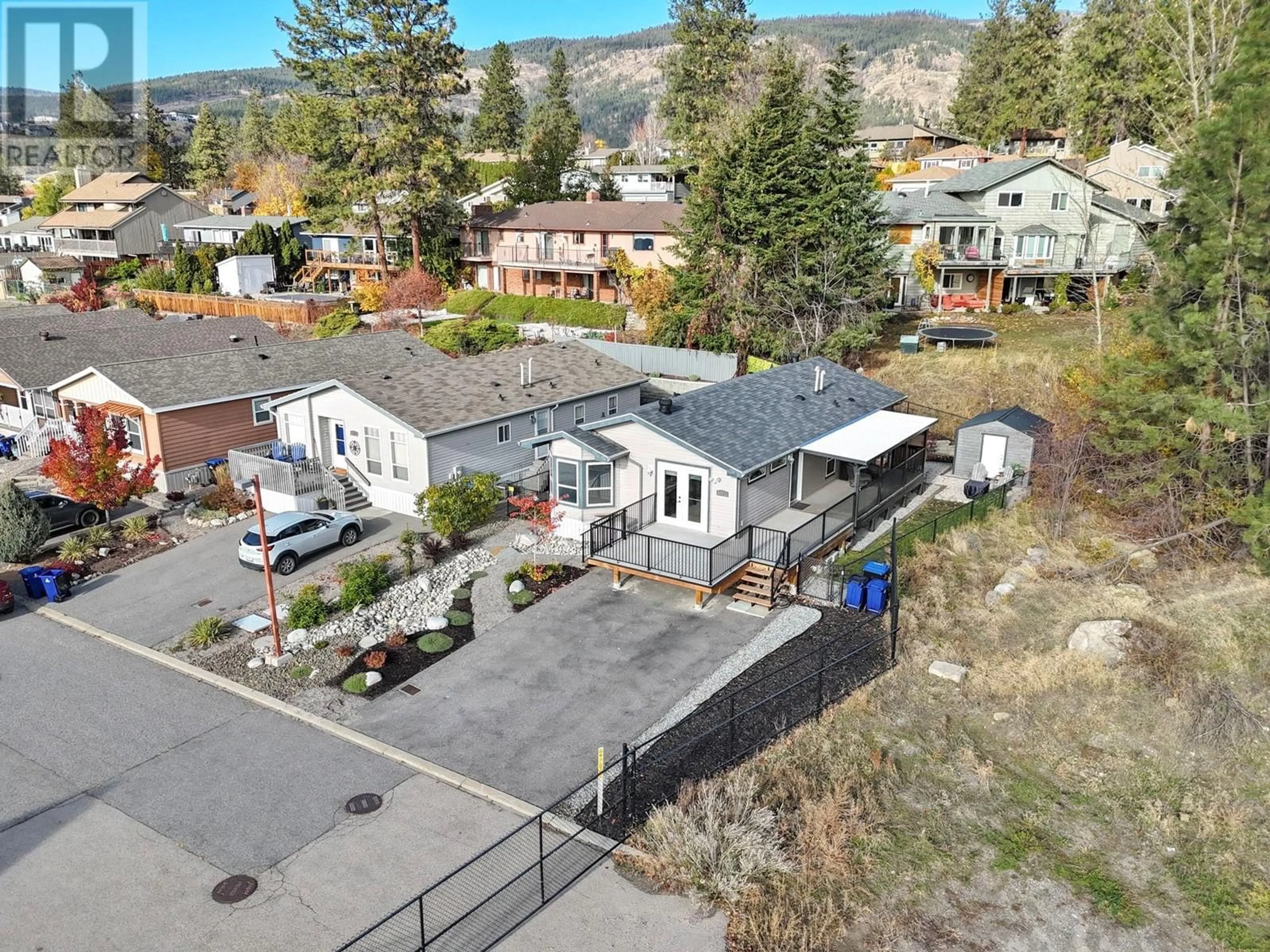 A pic from outside/outdoor area/front of a property/back of a property/a pic from drone, mountain view for 1329 - 2440 OLD OKANAGAN HIGHWAY, West Kelowna British Columbia V4T3A3