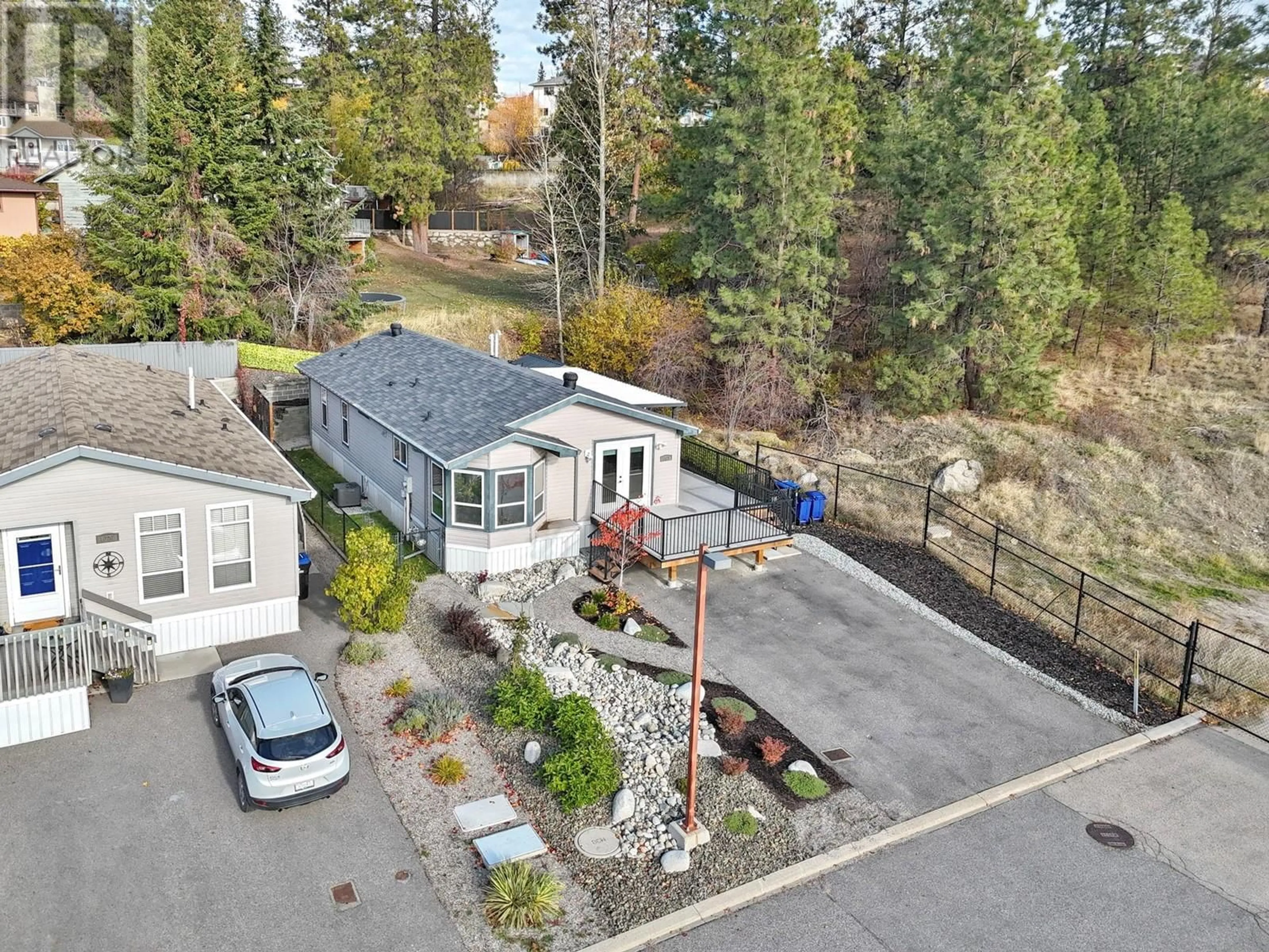 A pic from outside/outdoor area/front of a property/back of a property/a pic from drone, street for 1329 - 2440 OLD OKANAGAN HIGHWAY, West Kelowna British Columbia V4T3A3