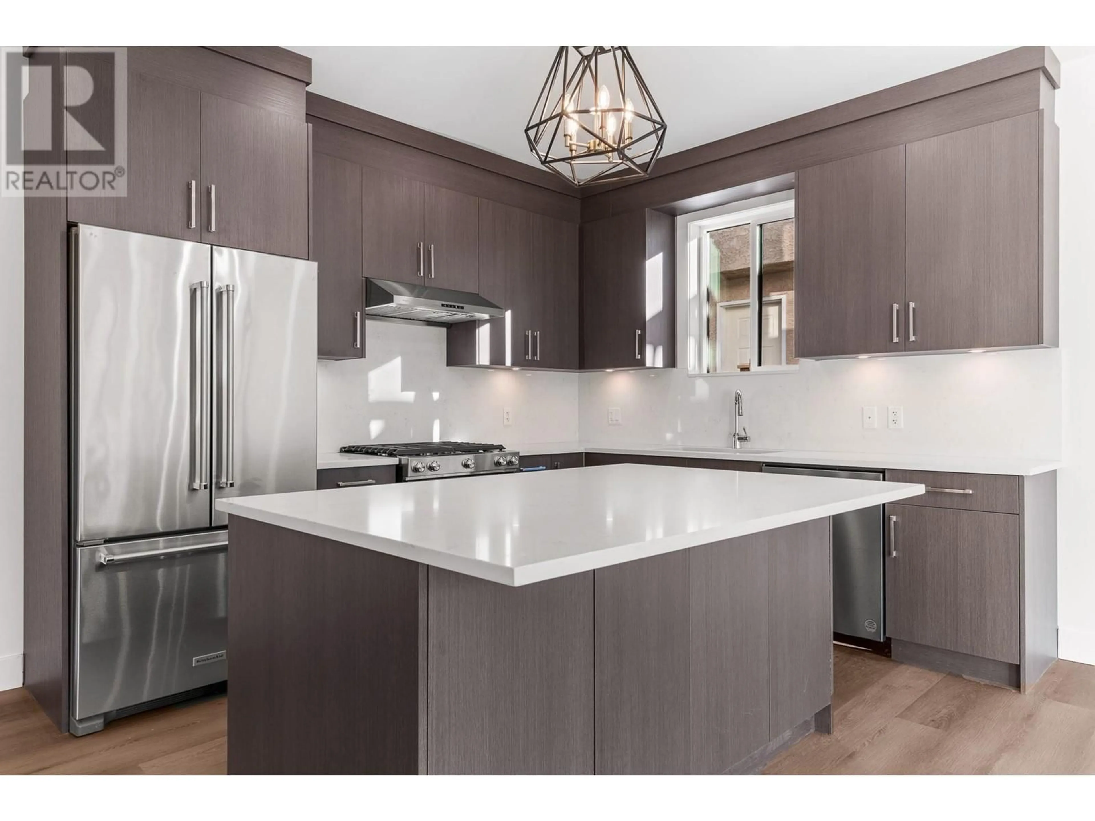 Open concept kitchen for 1715 Fairford Drive Unit# 102, Penticton British Columbia V2A6C7