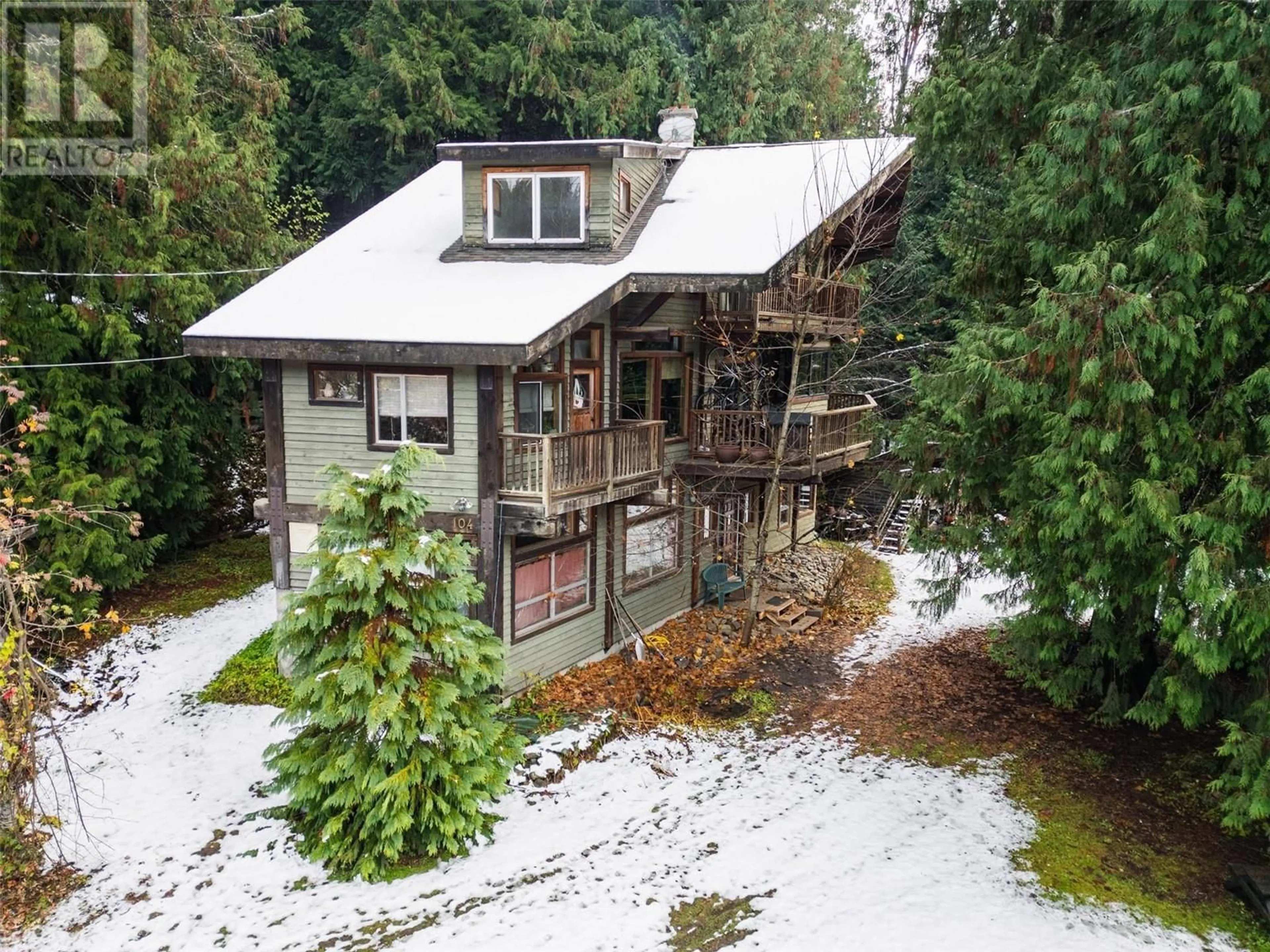 Frontside or backside of a home, cottage for 104 Oscar Bear Road, Ymir British Columbia V0G2K0