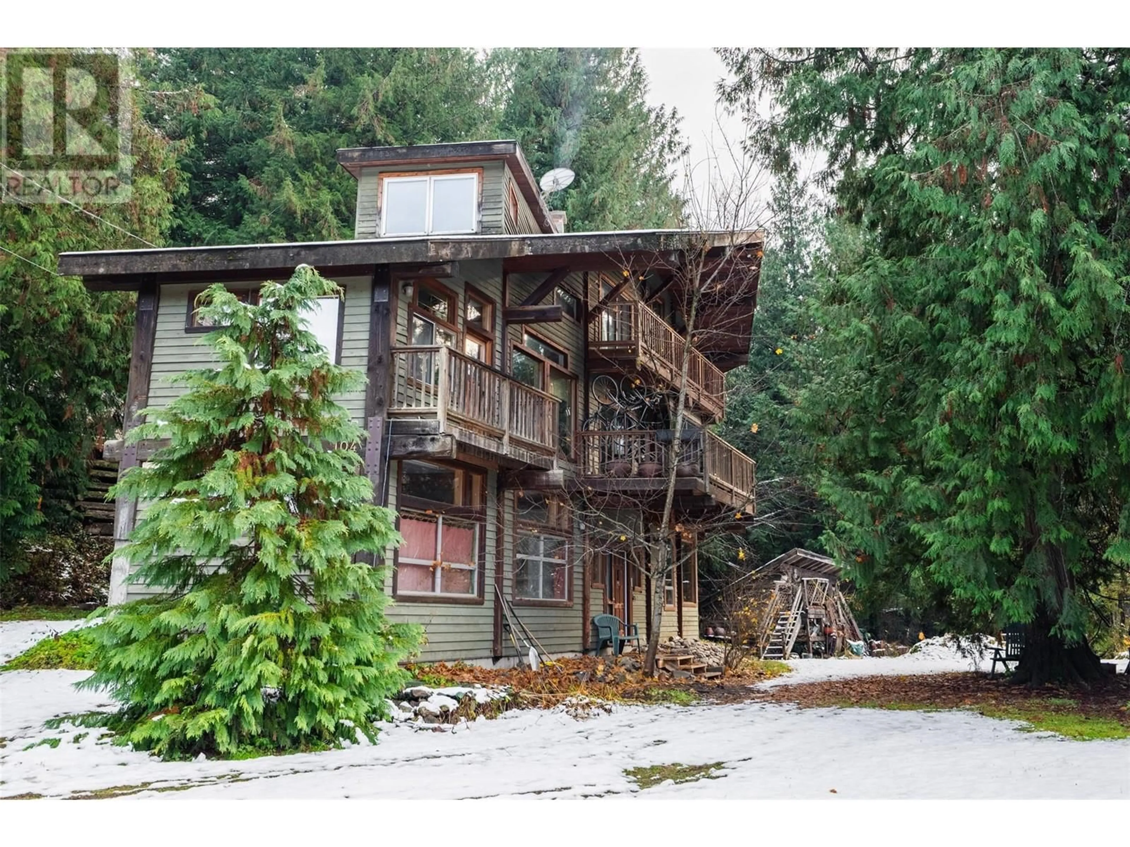 Frontside or backside of a home, cottage for 104 Oscar Bear Road, Ymir British Columbia V0G2K0