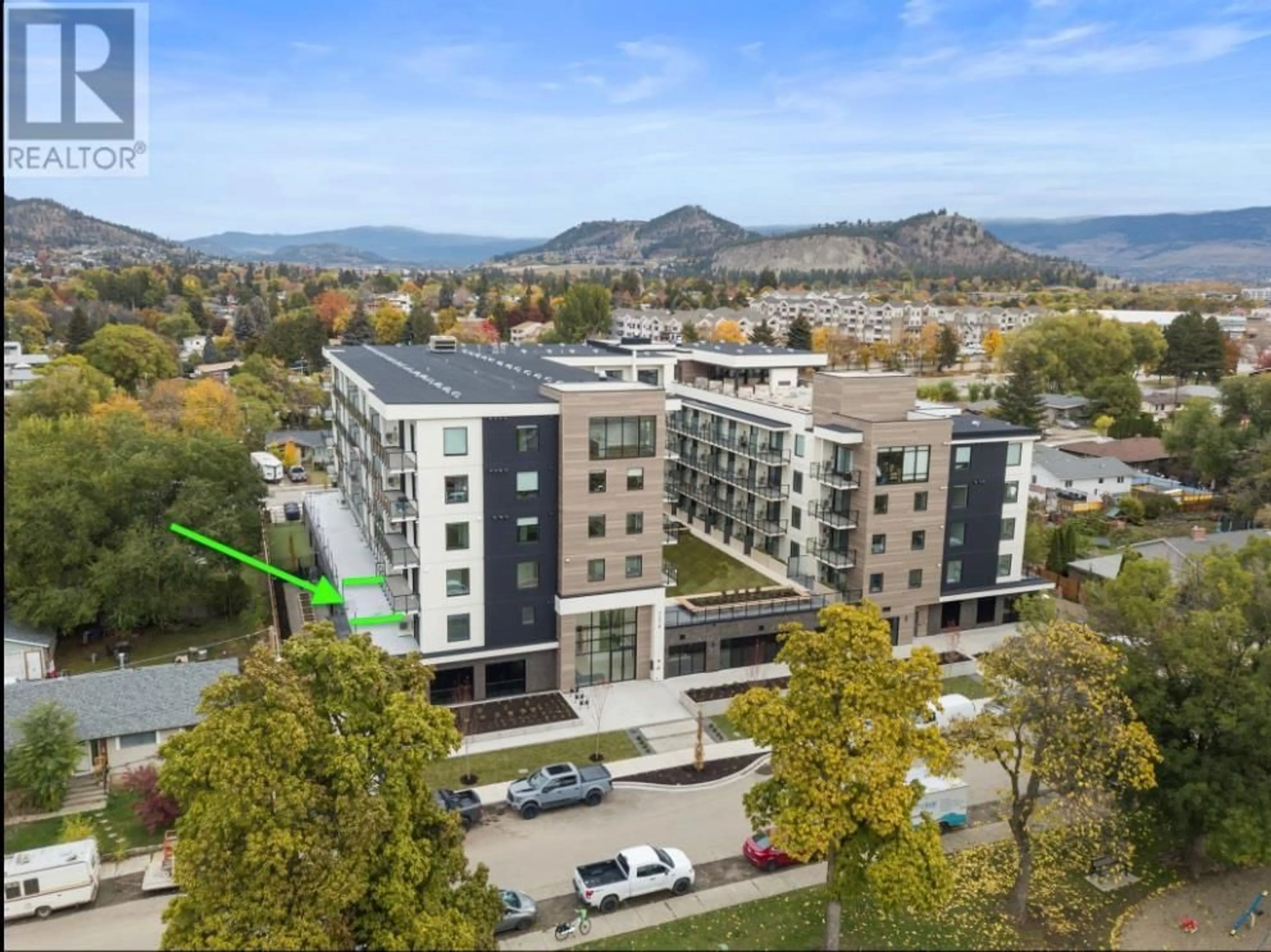 A pic from exterior of the house or condo, the front or back of building for 1274 Devonshire Avenue Unit# 203, Kelowna British Columbia V1Y6B7