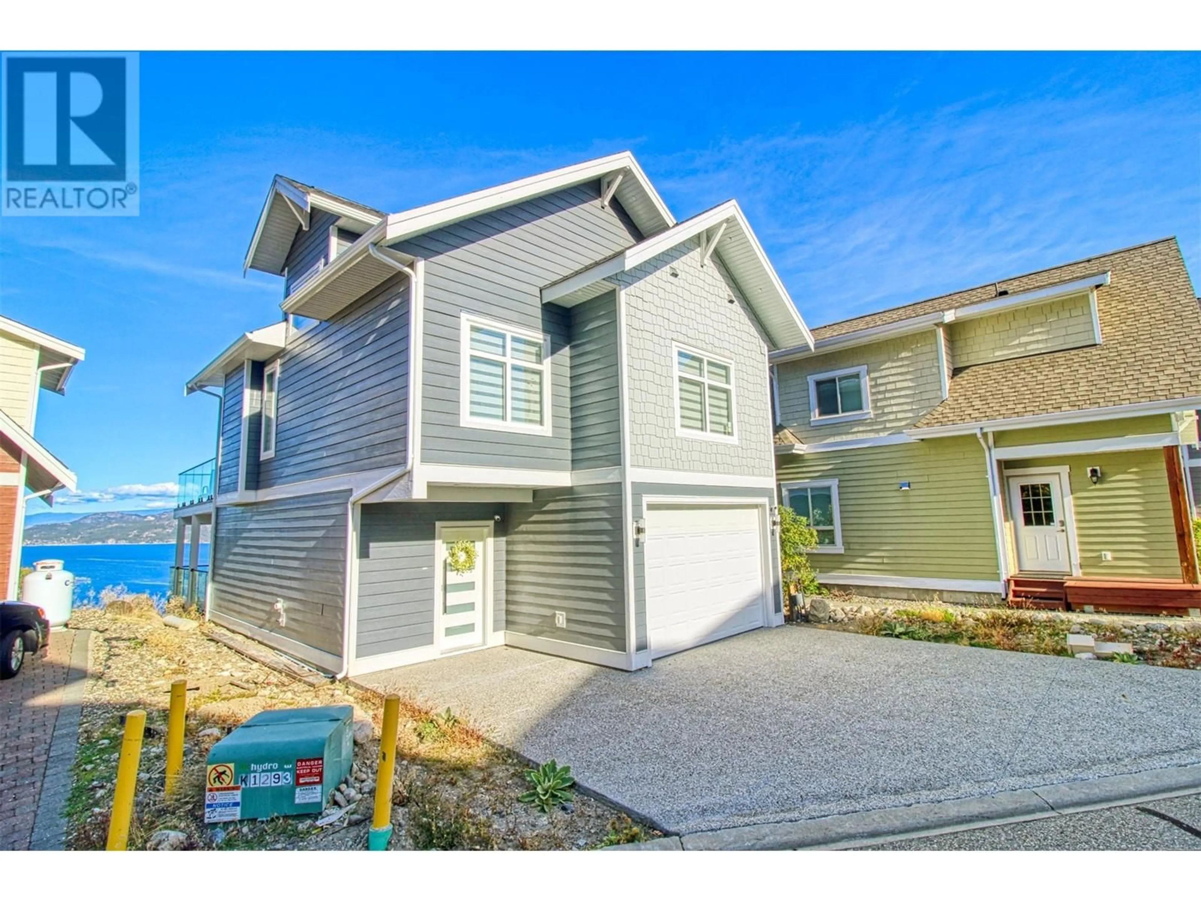 Home with vinyl exterior material, water/lake/river/ocean view for 243 - 6725 LA PALMA LOOP, Kelowna British Columbia V1Z3R8