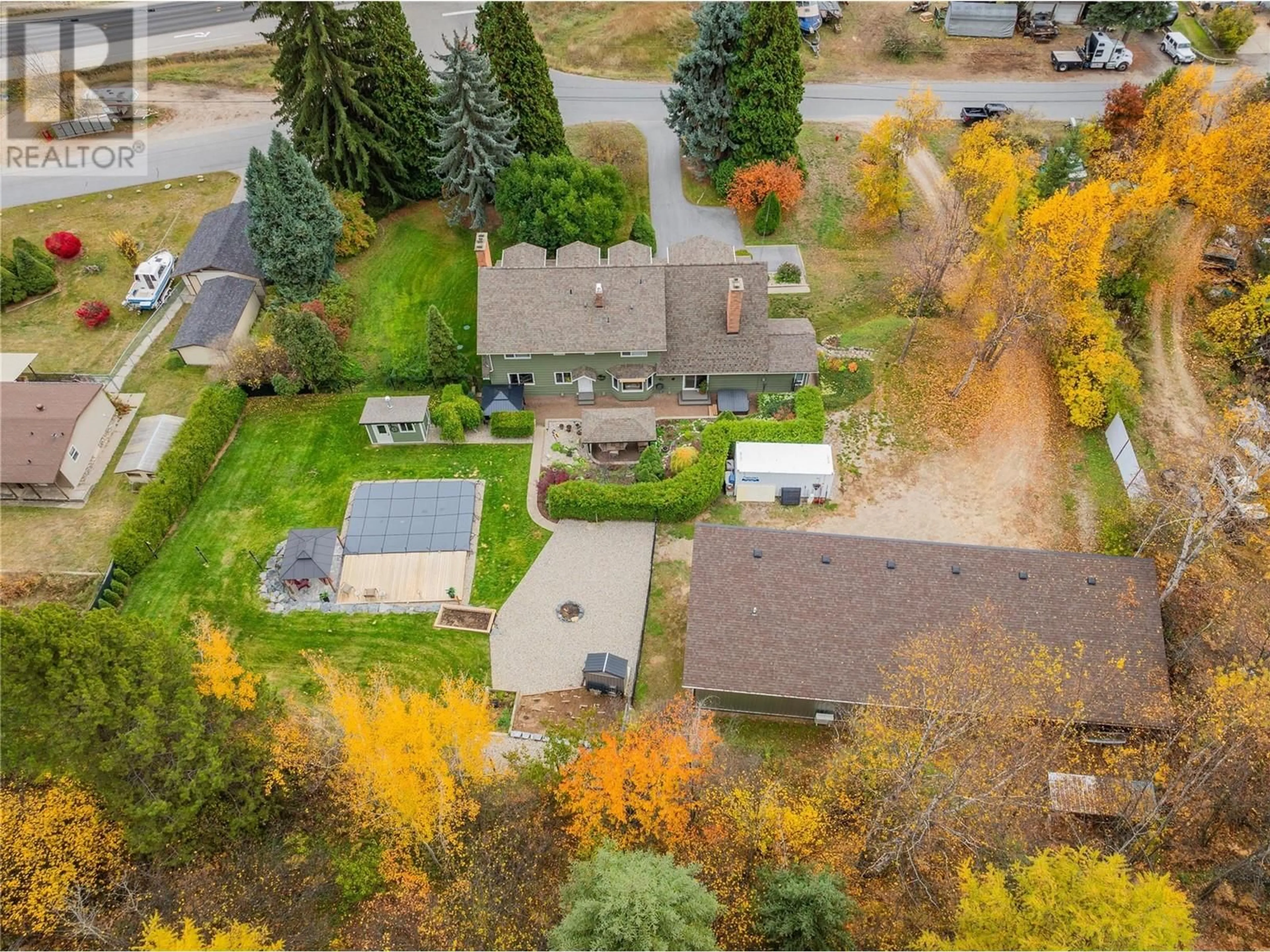 Frontside or backside of a home, the fenced backyard for 506 201st Avenue, Castlegar British Columbia V1N3P7