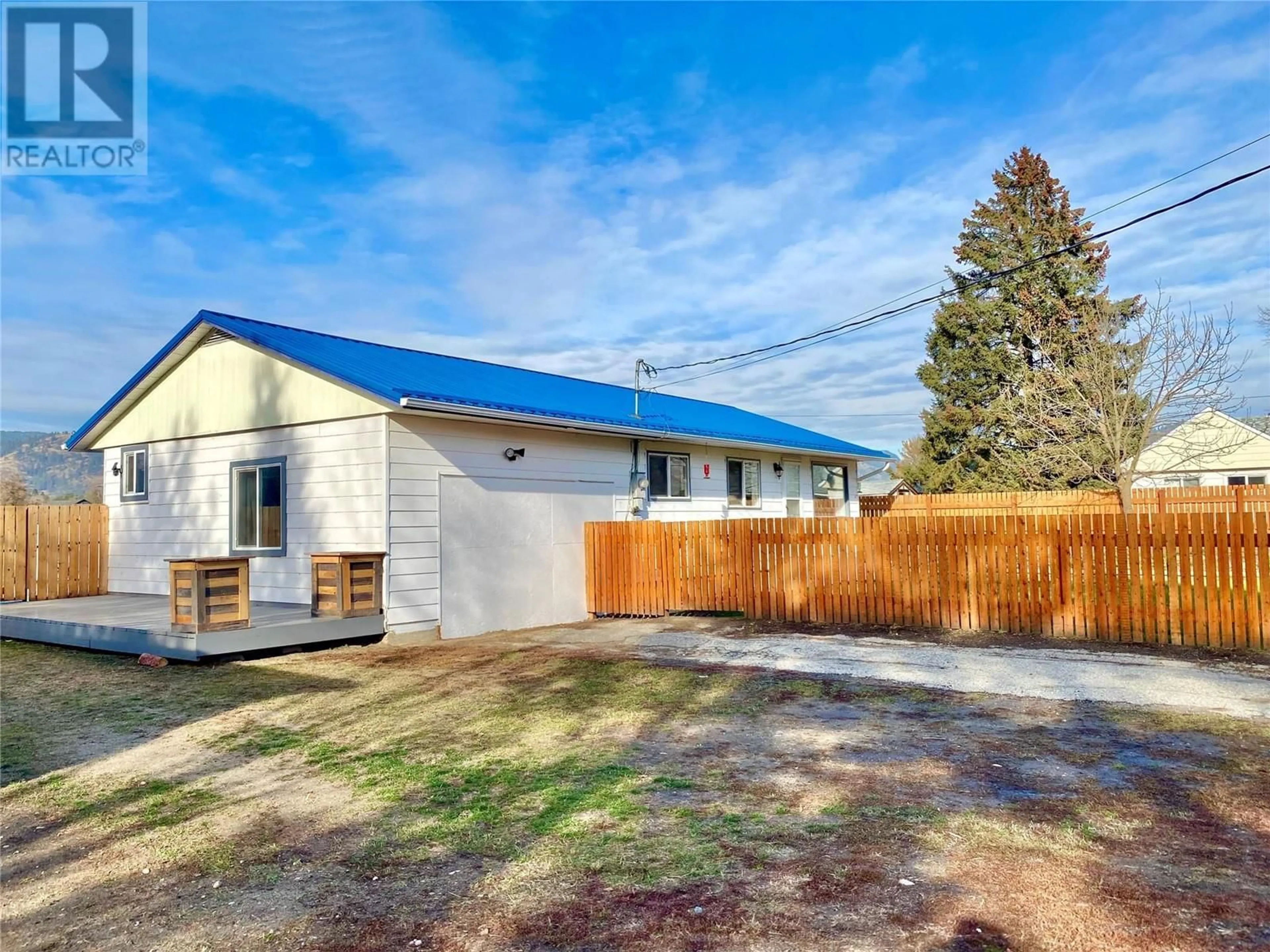 Frontside or backside of a home, the fenced backyard for 5775 BEATRICE Street Lot# LOT B, Grand Forks British Columbia V0H1H0