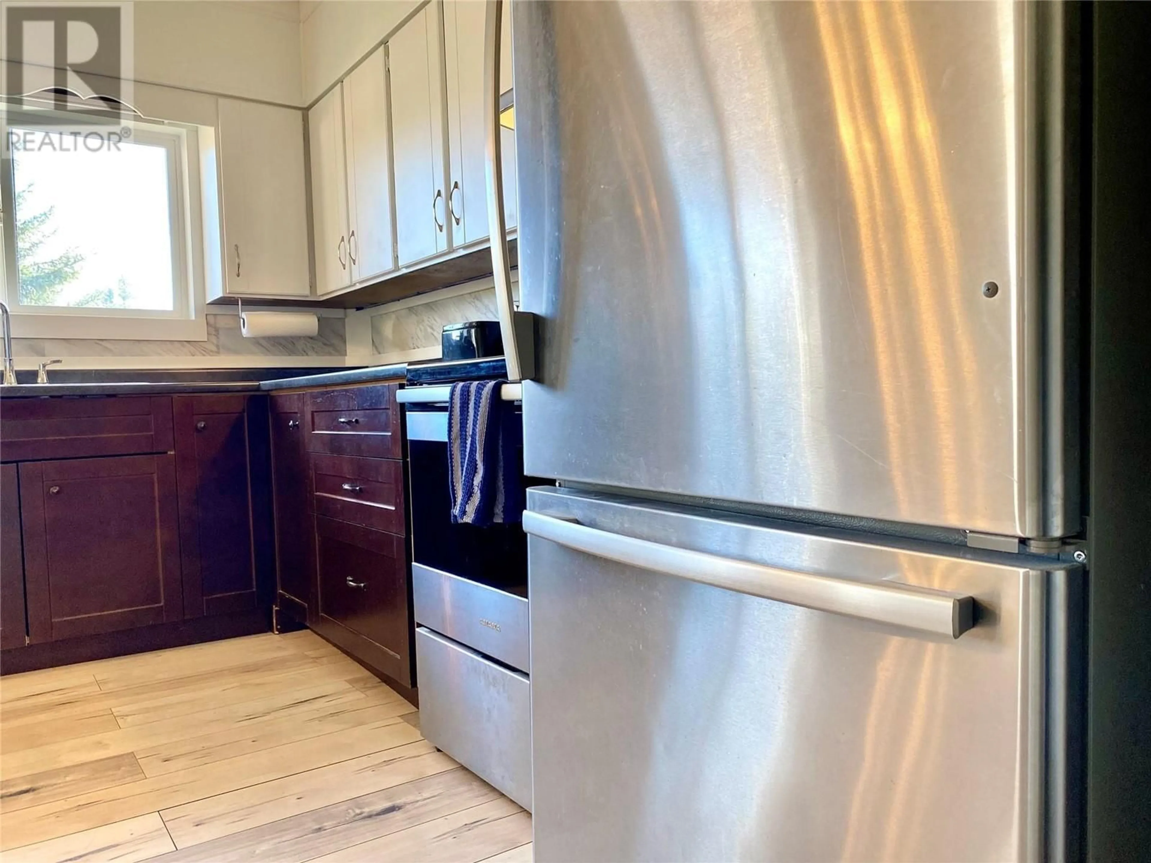 Standard kitchen, wood floors for 5775 BEATRICE Street, Grand Forks British Columbia V0H1H0