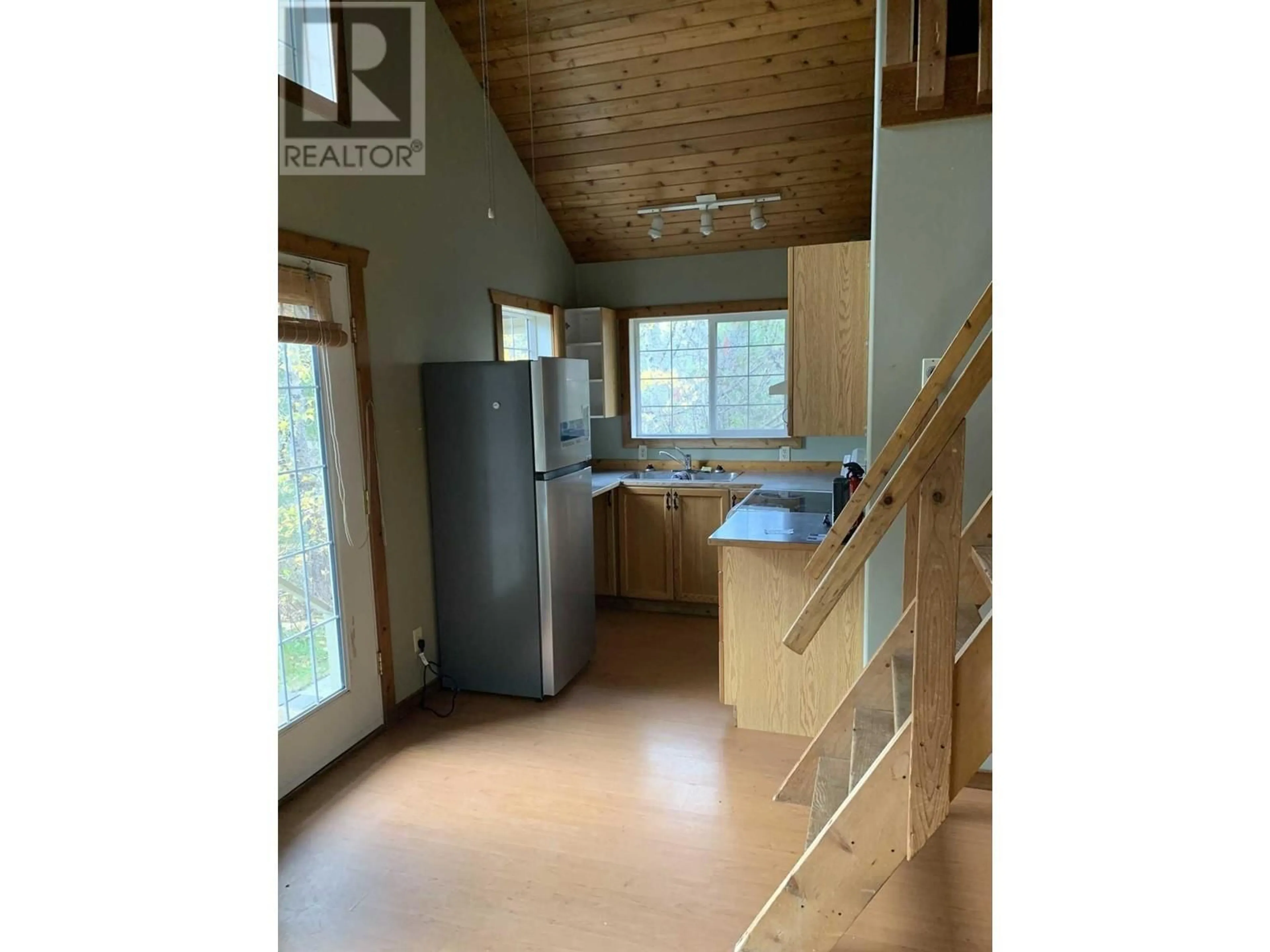 Open concept kitchen, wood/laminate floor for 5525 DUCKSWAY ROAD, Winlaw British Columbia V0G2J0