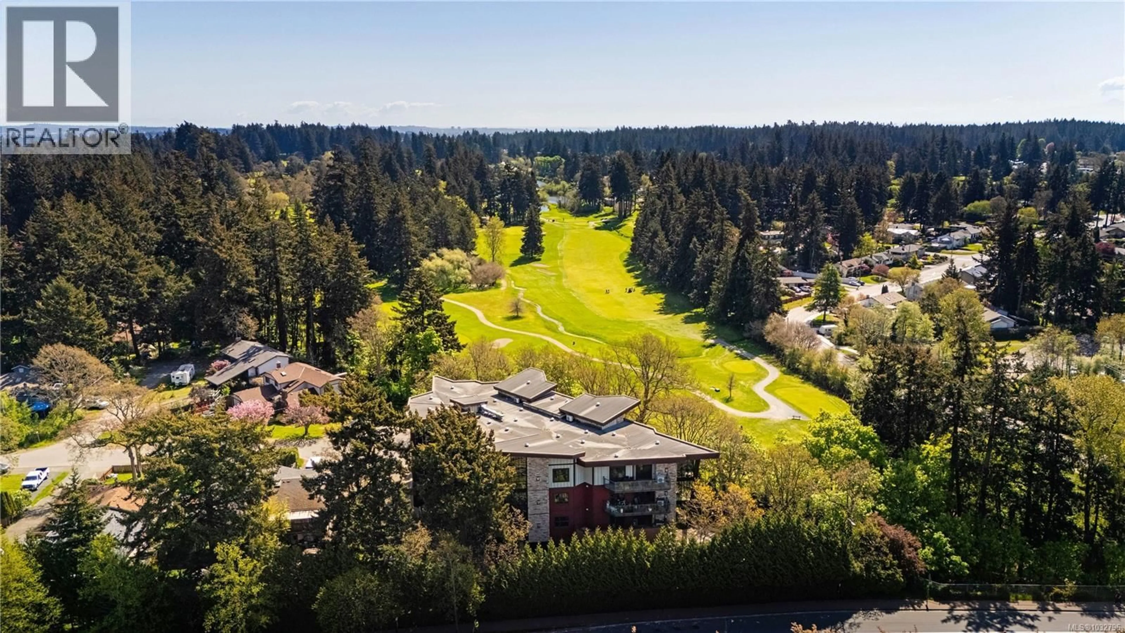 A pic from outside/outdoor area/front of a property/back of a property/a pic from drone, forest/trees view for 402 - 2850 ALDWYND ROAD, Langford British Columbia V9B3S7