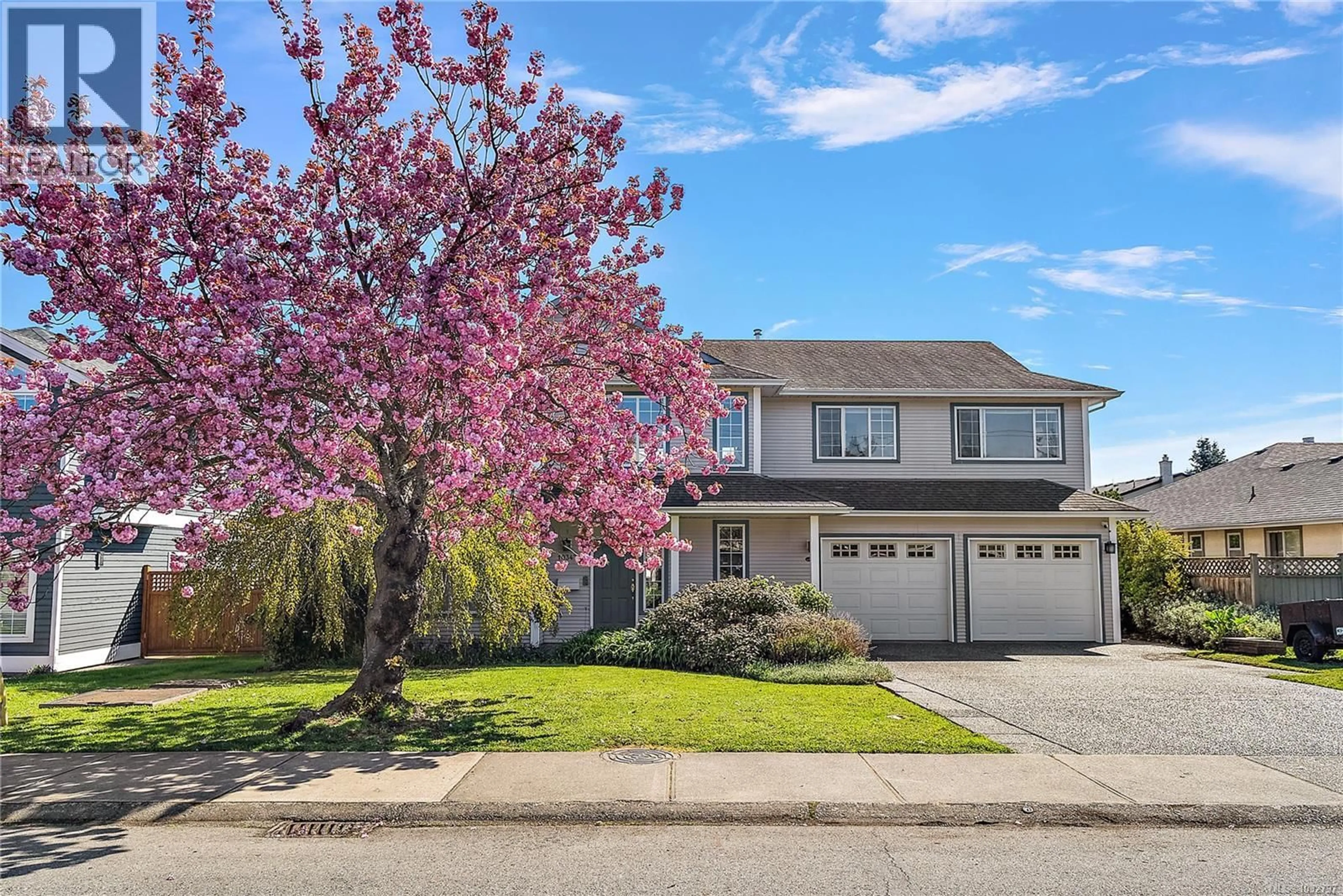 Home with vinyl exterior material, street for 10347 BOWERBANK ROAD, Sidney British Columbia V8L3L6