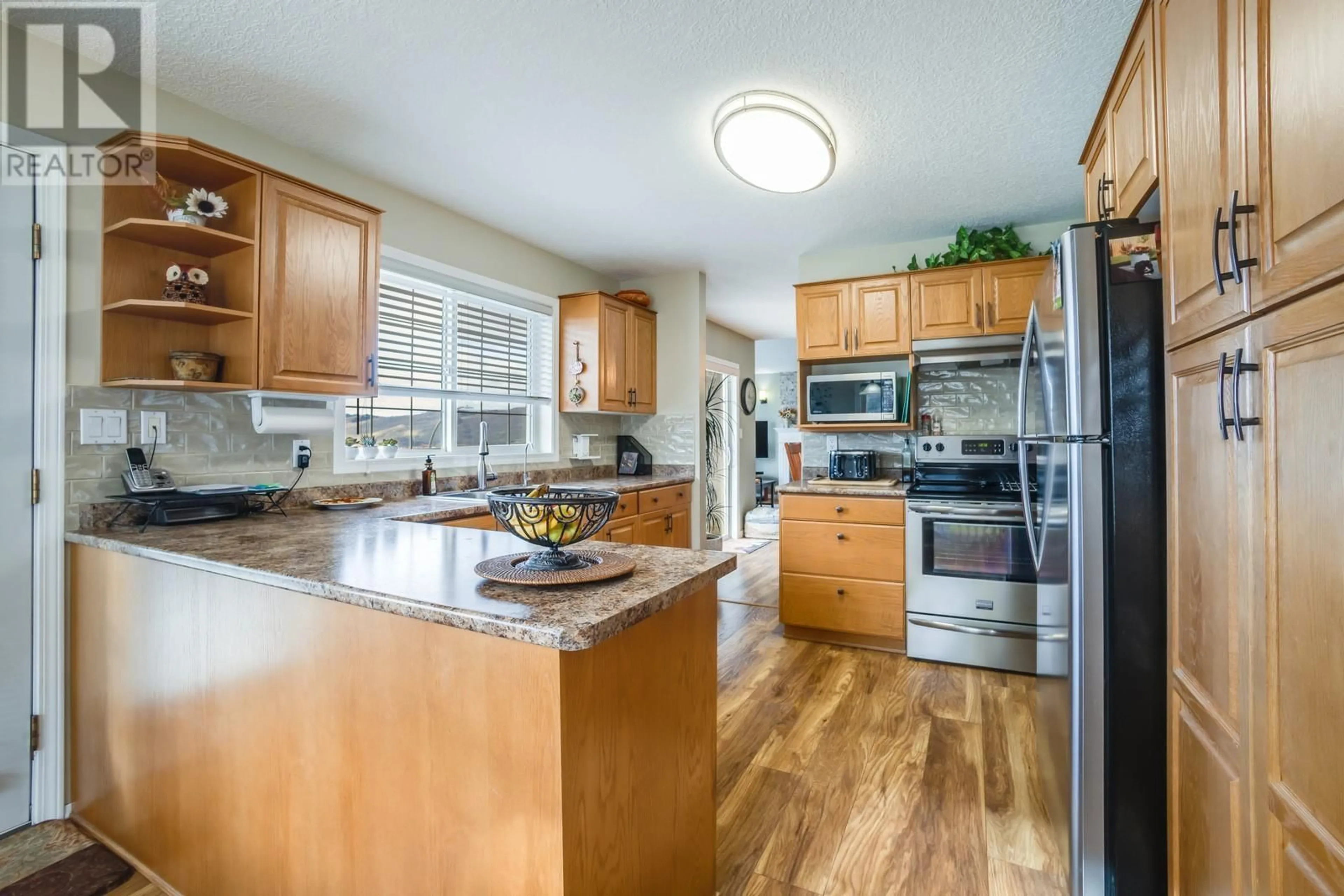 Open concept kitchen for 863 Mt Grady Place, Vernon British Columbia V1B2Z2