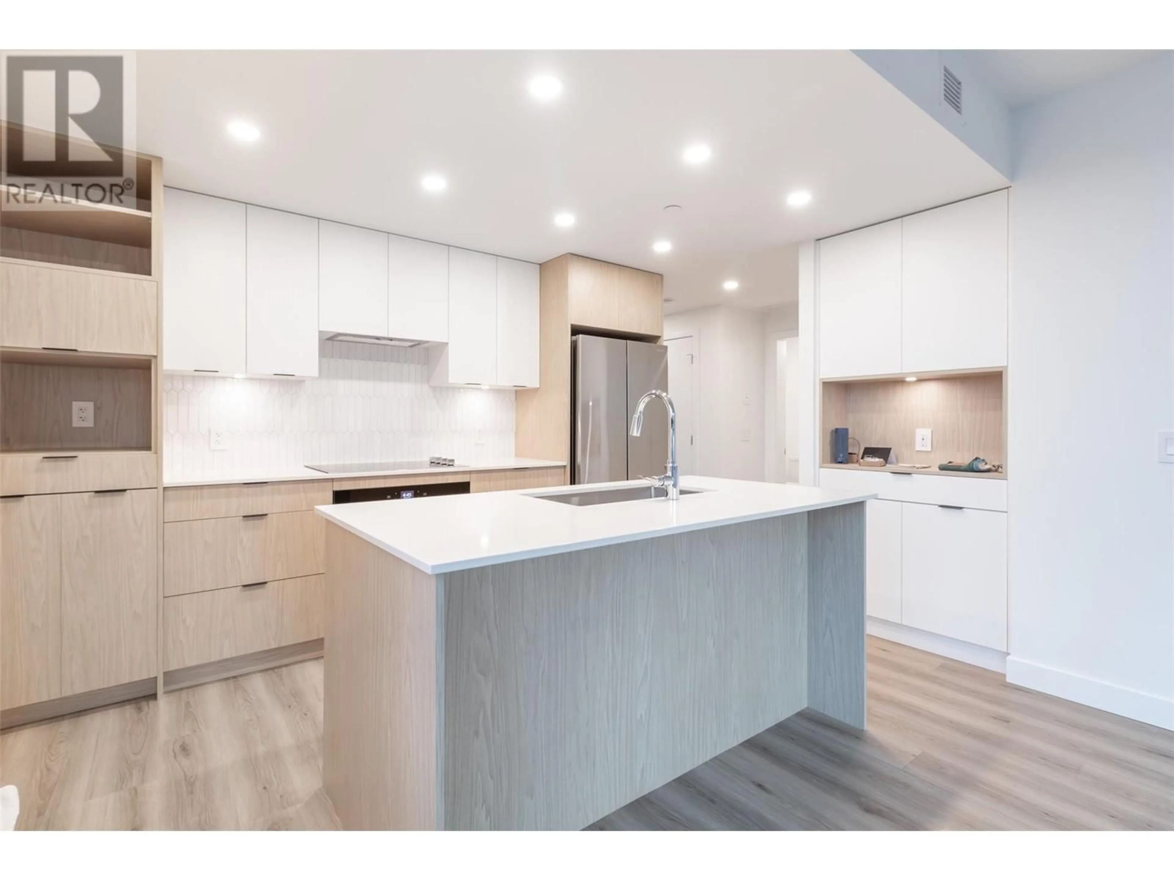 Open concept kitchen for 1488 Bertram Street Unit# 1610, Kelowna British Columbia V1Y0M6