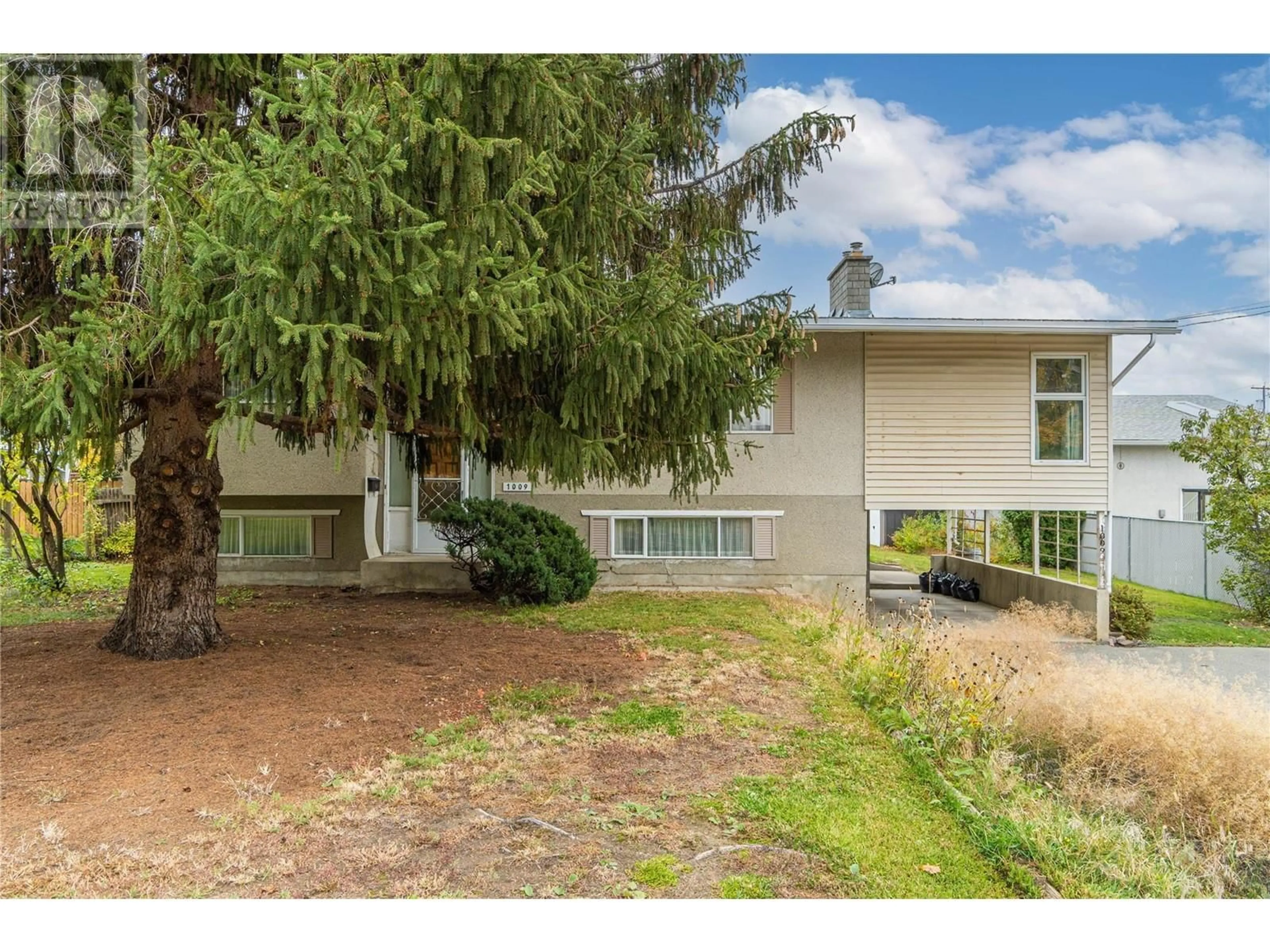 Frontside or backside of a home for 1009 Desmond Street, Kamloops British Columbia V2B5K9