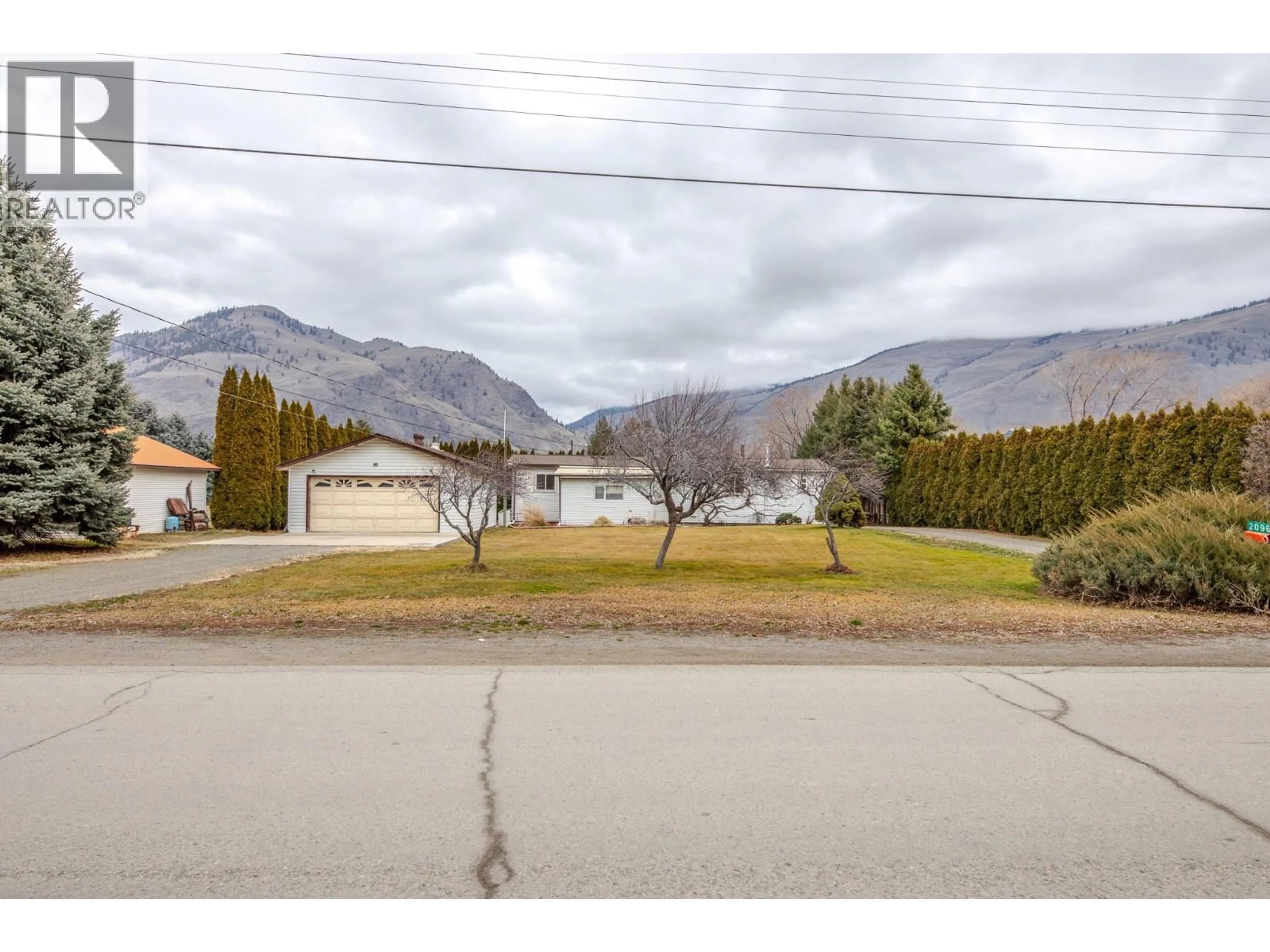A pic from outside/outdoor area/front of a property/back of a property/a pic from drone, mountain view for 2096 MAIN STREET, Cawston British Columbia V0X1C1