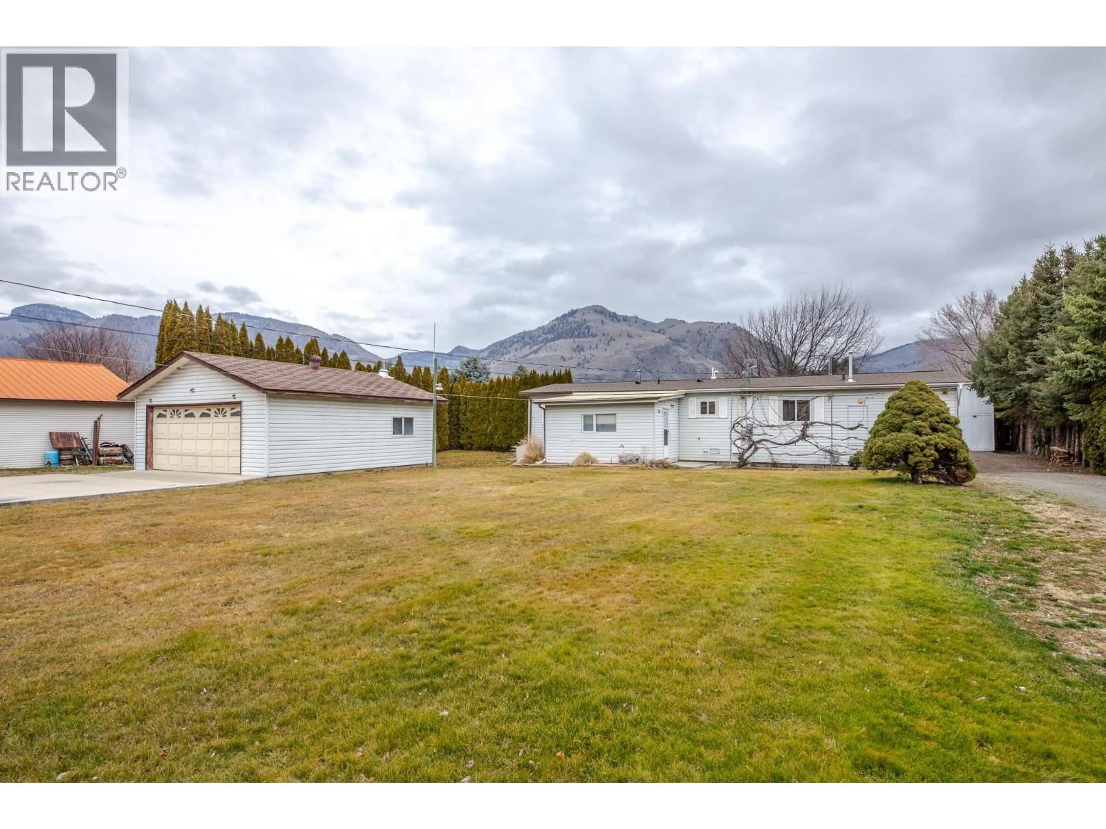 A pic from outside/outdoor area/front of a property/back of a property/a pic from drone, mountain view for 2096 MAIN STREET, Cawston British Columbia V0X1C1