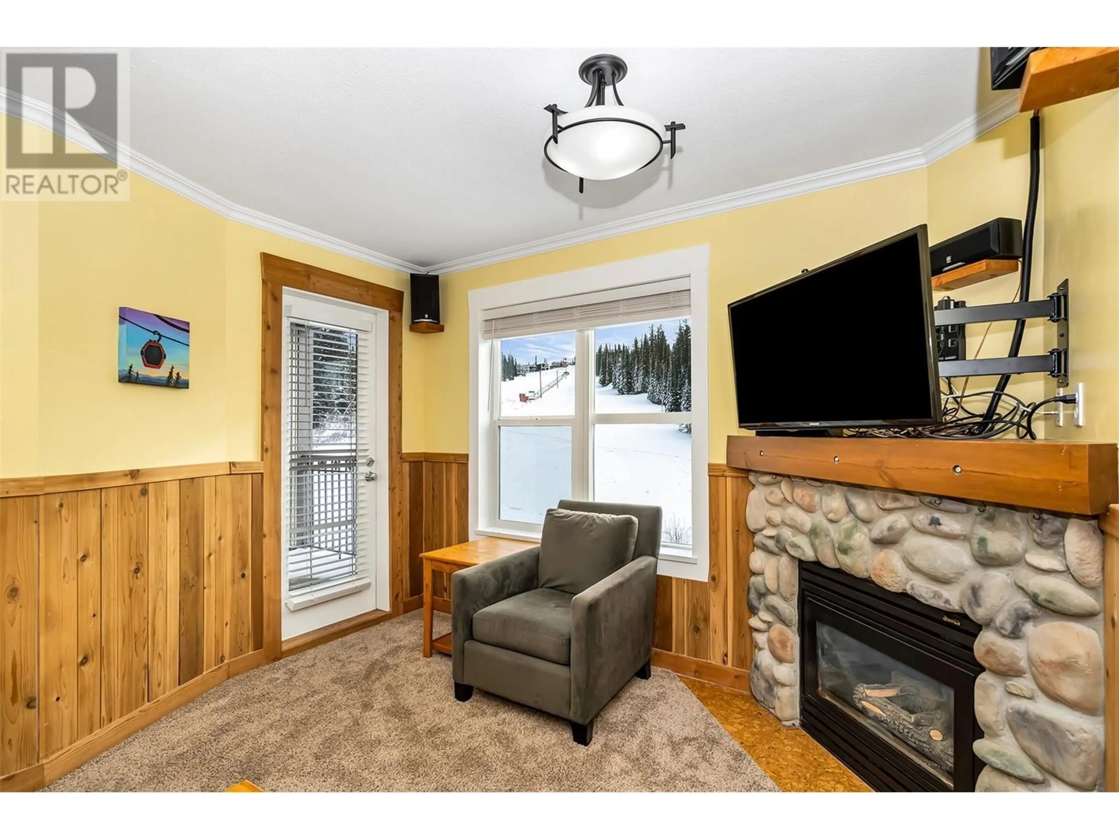 Living room, wood floors for 9810 Silver Star Road Unit# 306, Silver Star British Columbia V1B3M1