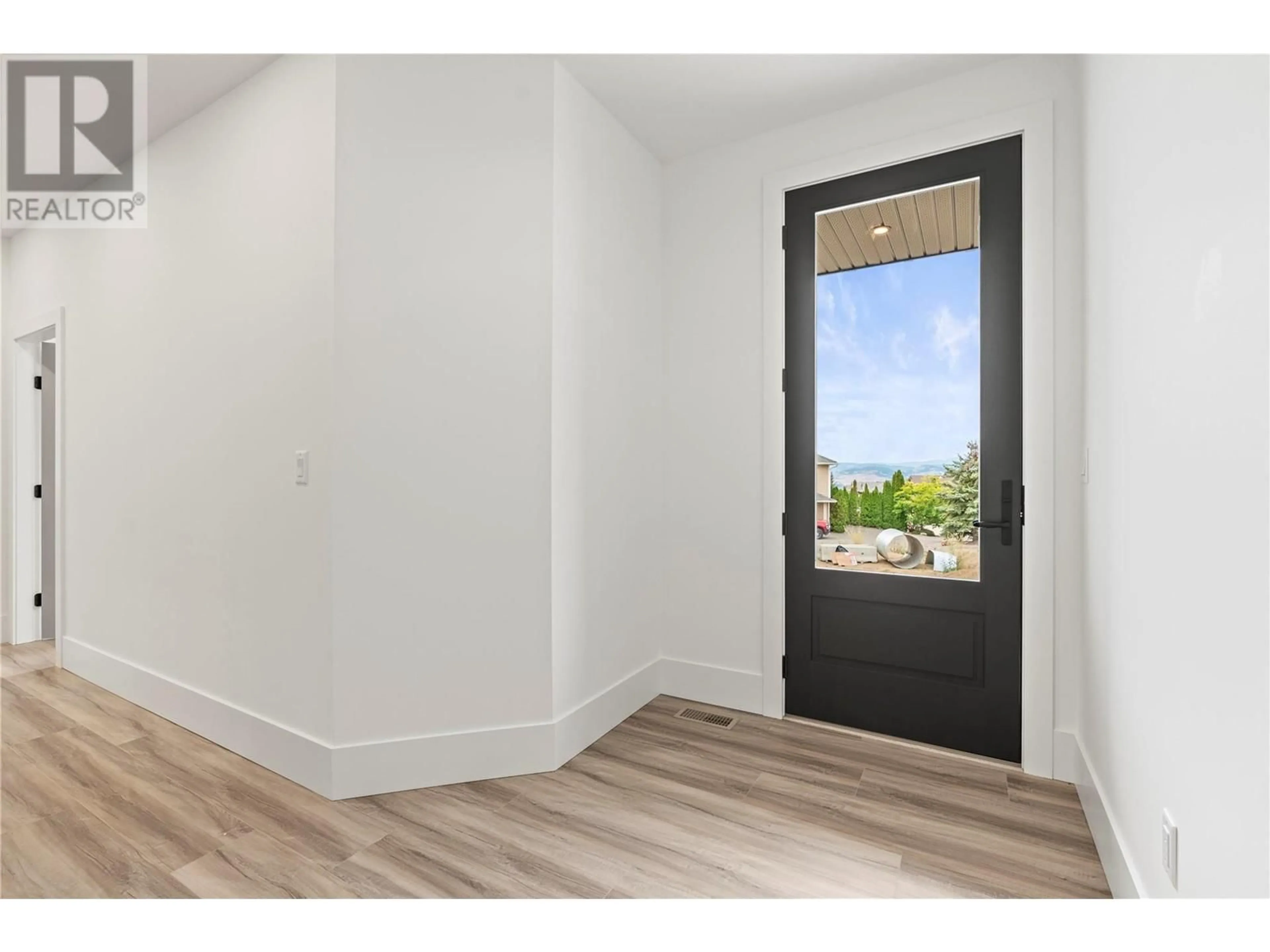 Indoor entryway, wood floors for 7004 Manning Place, Vernon British Columbia V1B0B6