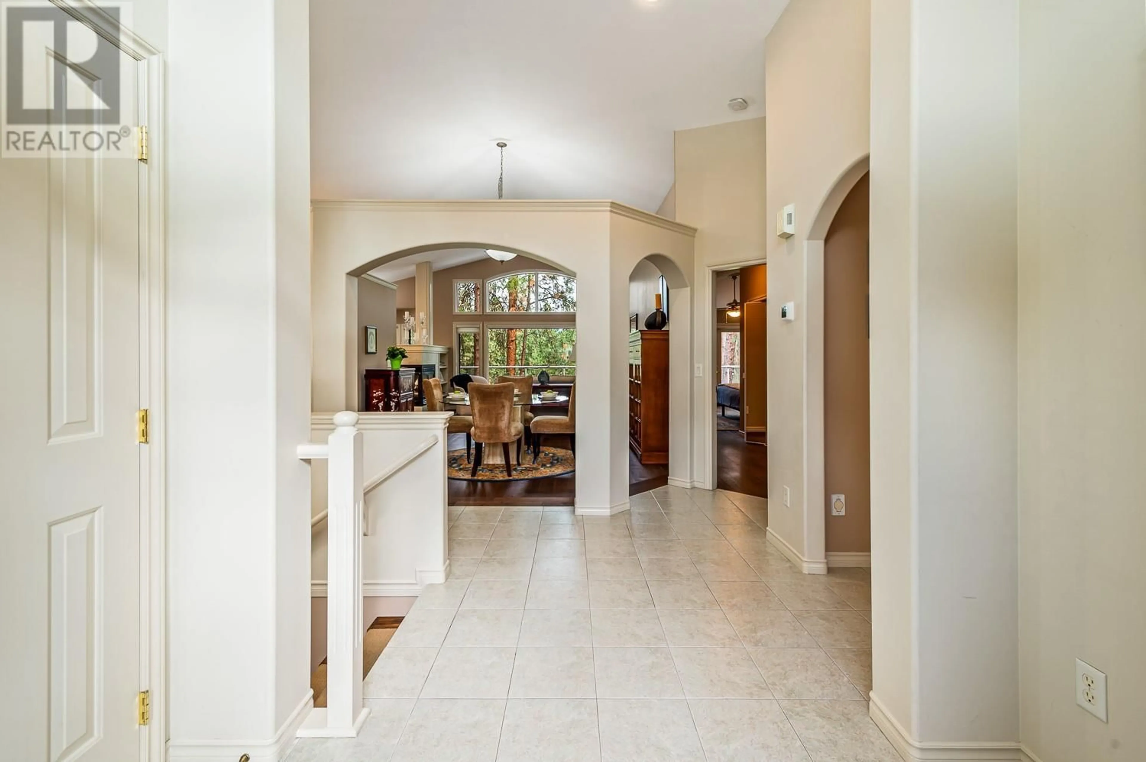 Indoor foyer, wood floors for 4141 Gallaghers Boulevard S, Kelowna British Columbia V1W4V2